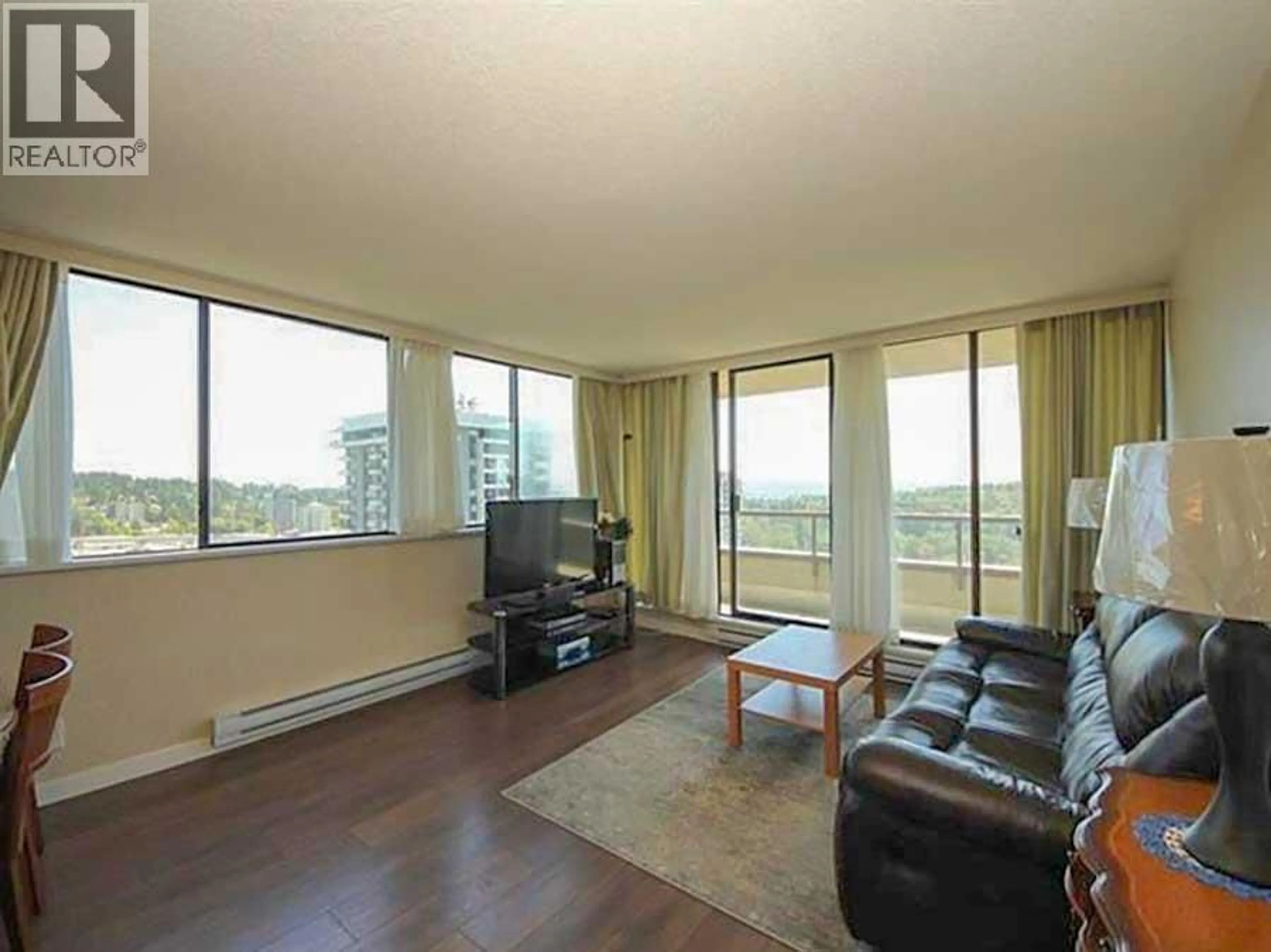 Living room with furniture, wood/laminate floor for 2002 - 3970 CARRIGAN COURT, Burnaby British Columbia V3N4S5