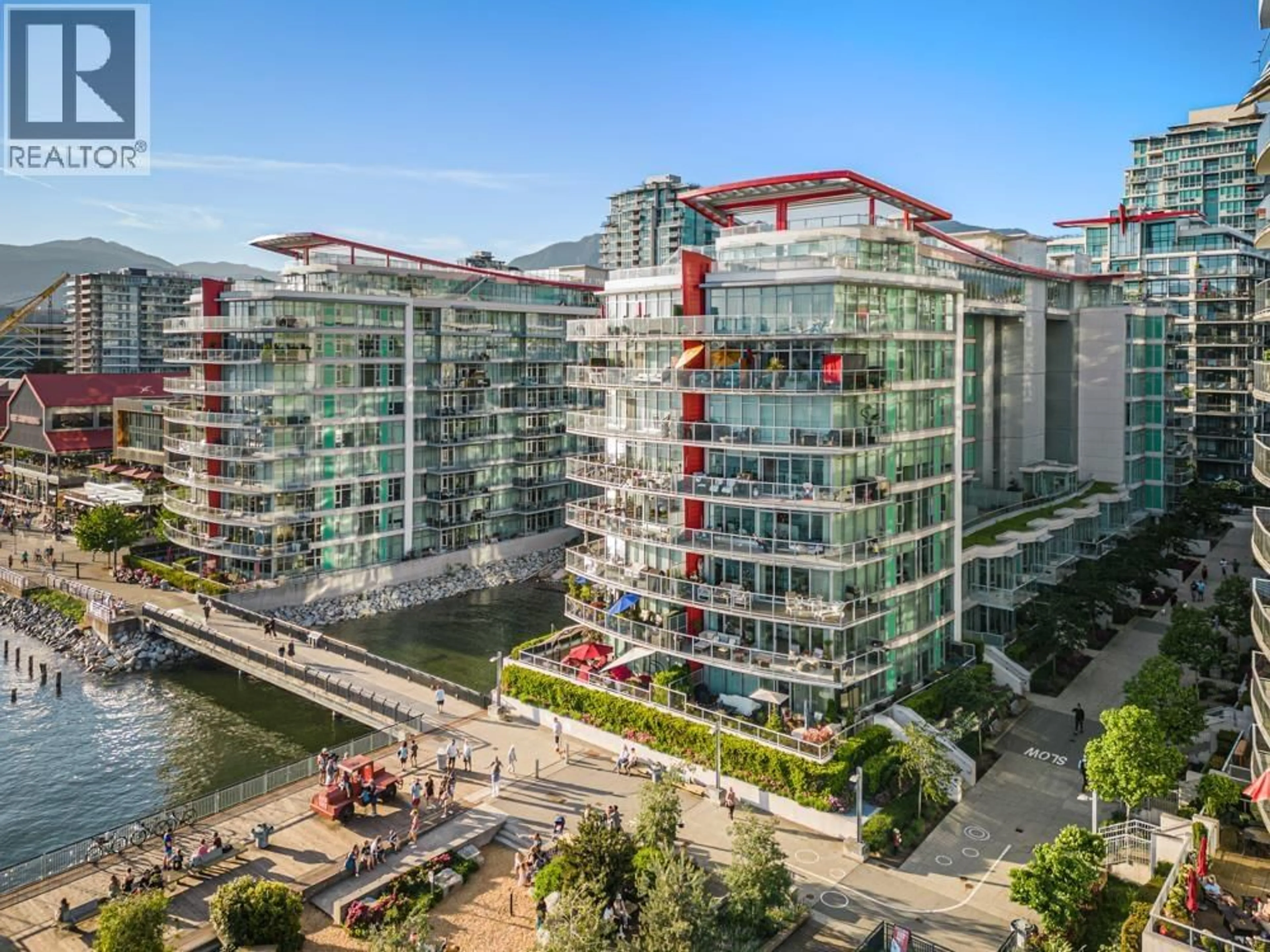 A pic from outside/outdoor area/front of a property/back of a property/a pic from drone, city buildings view from balcony for 204 - 175 VICTORY SHIP WAY, North Vancouver British Columbia V7L0G1