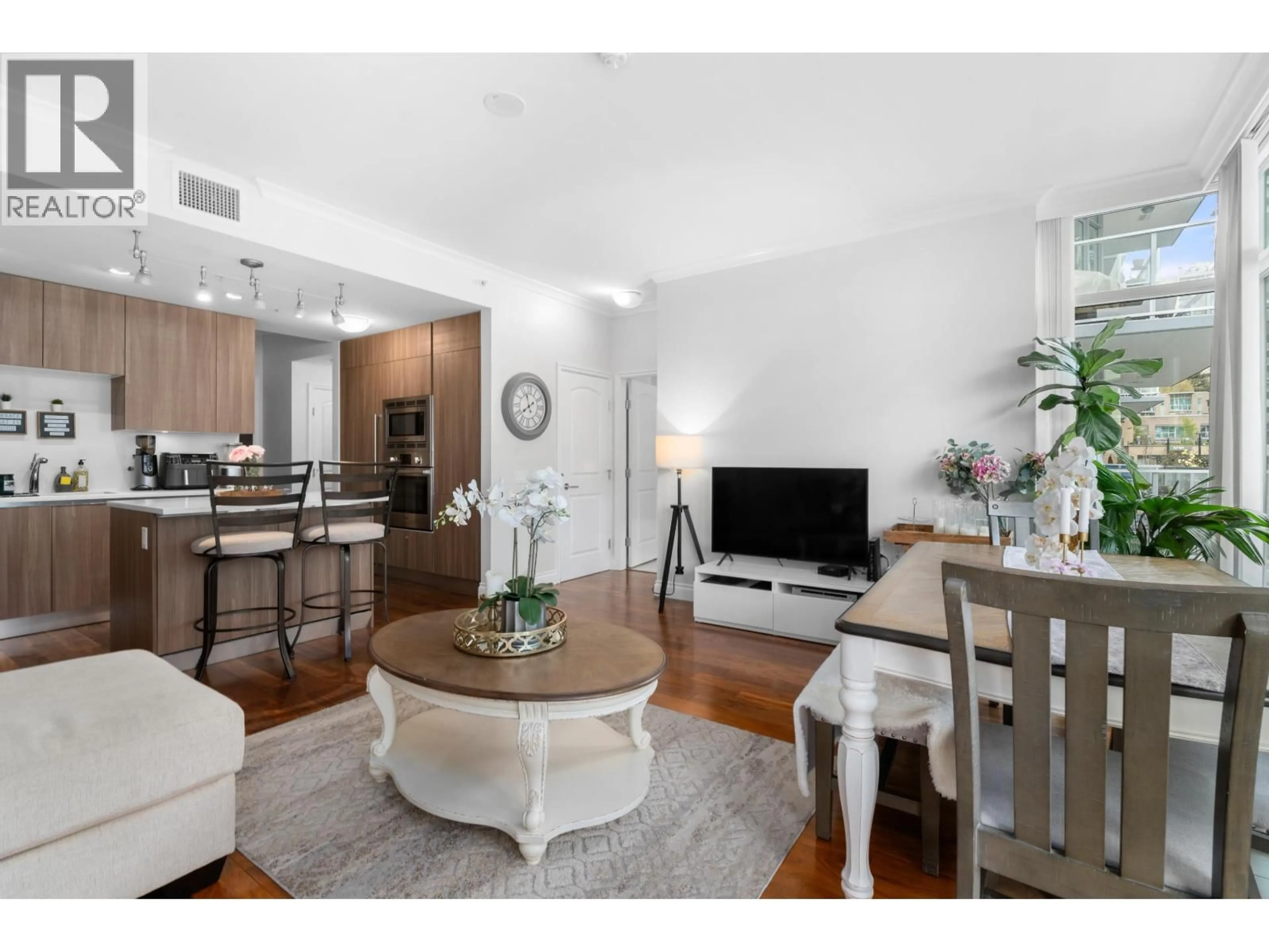 Living room with furniture, unknown for 204 - 175 VICTORY SHIP WAY, North Vancouver British Columbia V7L0G1