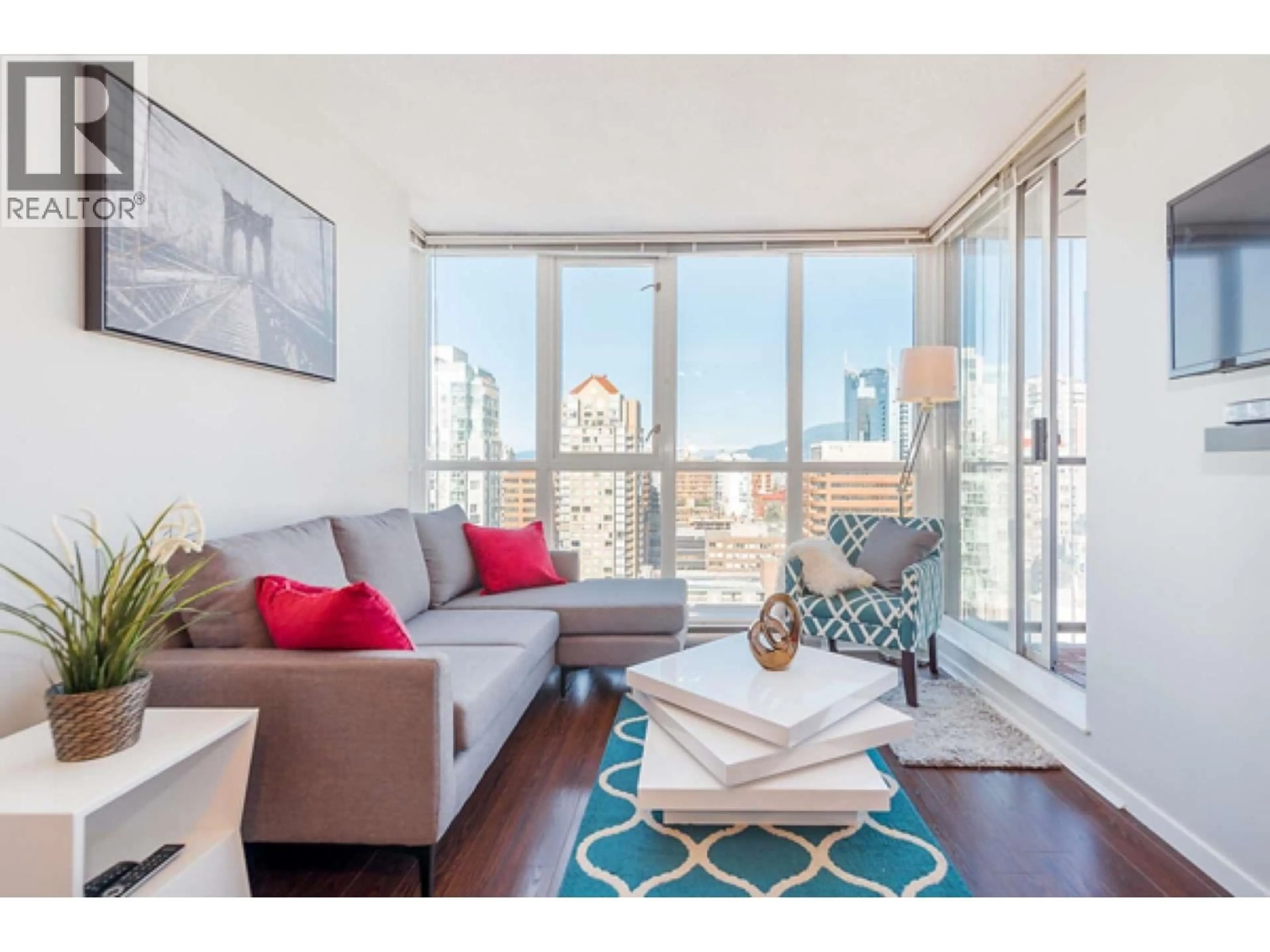 Living room with furniture, wood/laminate floor for 2201 - 1155 SEYMOUR STREET, Vancouver British Columbia V6B1K2