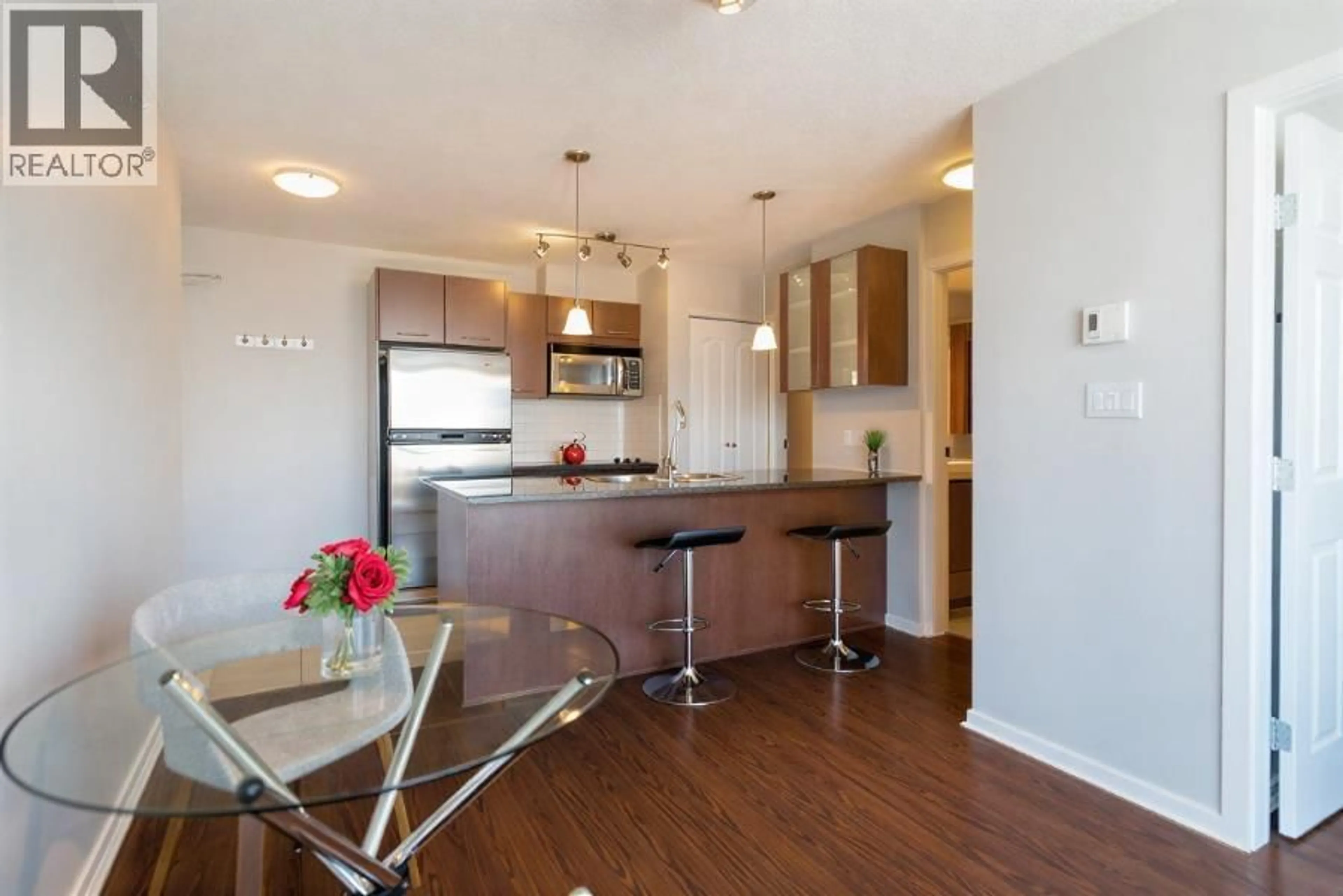 Open concept kitchen, wood/laminate floor for 2201 - 1155 SEYMOUR STREET, Vancouver British Columbia V6B1K2