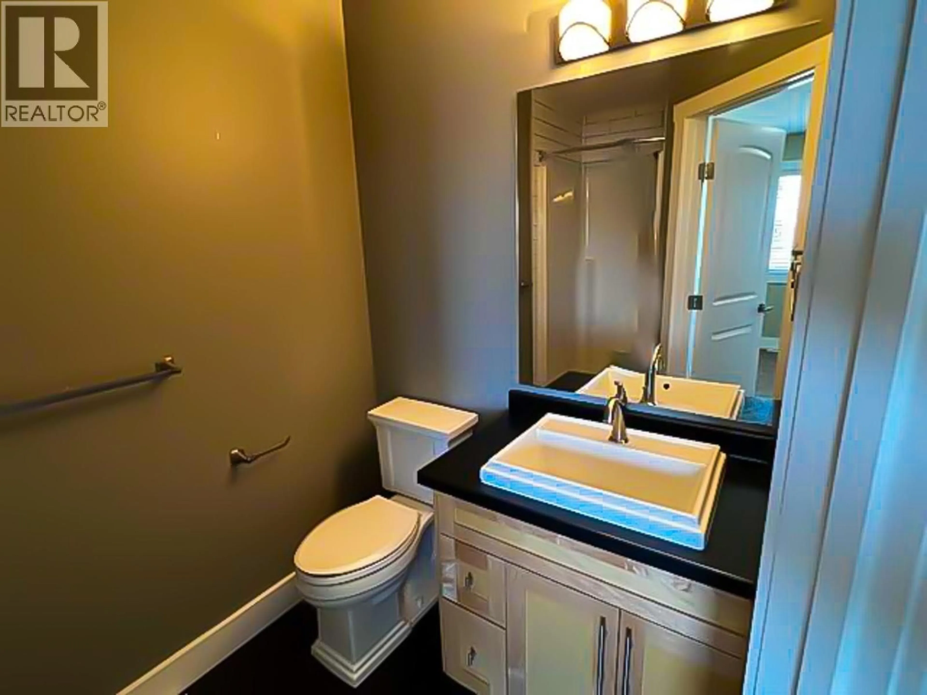 Standard bathroom, ceramic/tile floor for 8348 87 AVENUE, Fort St. John British Columbia V1J0K8