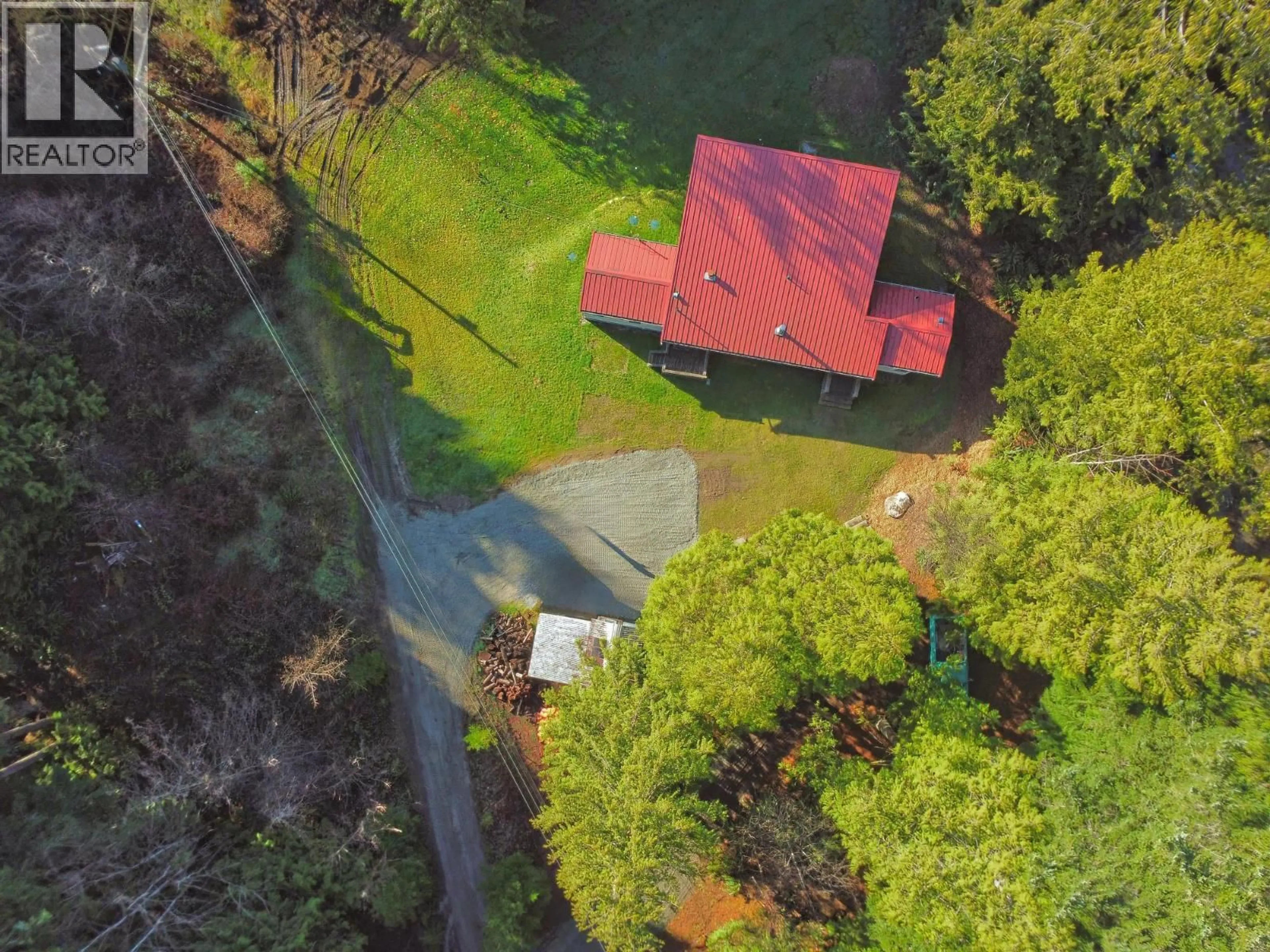 A pic from outside/outdoor area/front of a property/back of a property/a pic from drone, unknown for 7103 SECHELT INLET ROAD, Sechelt British Columbia V7Z0P1