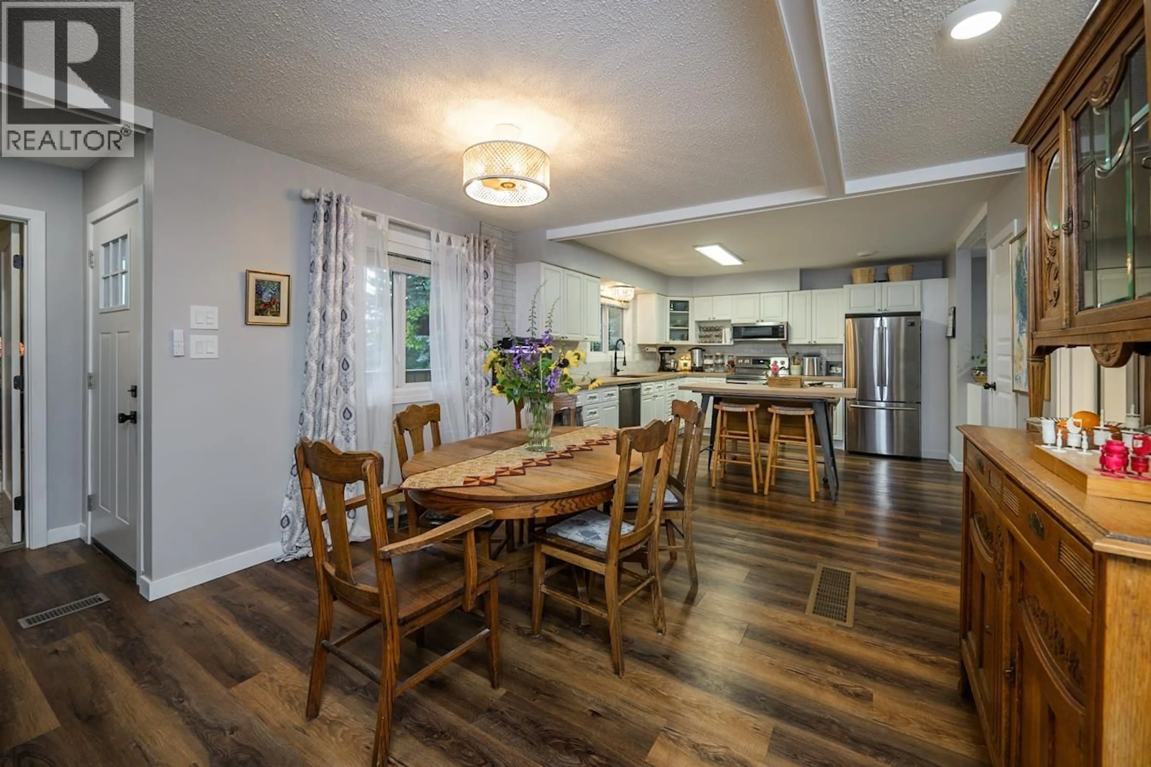 Dining room, wood/laminate floor for 3582 ROSIA ROAD, Prince George British Columbia V2K4Y6