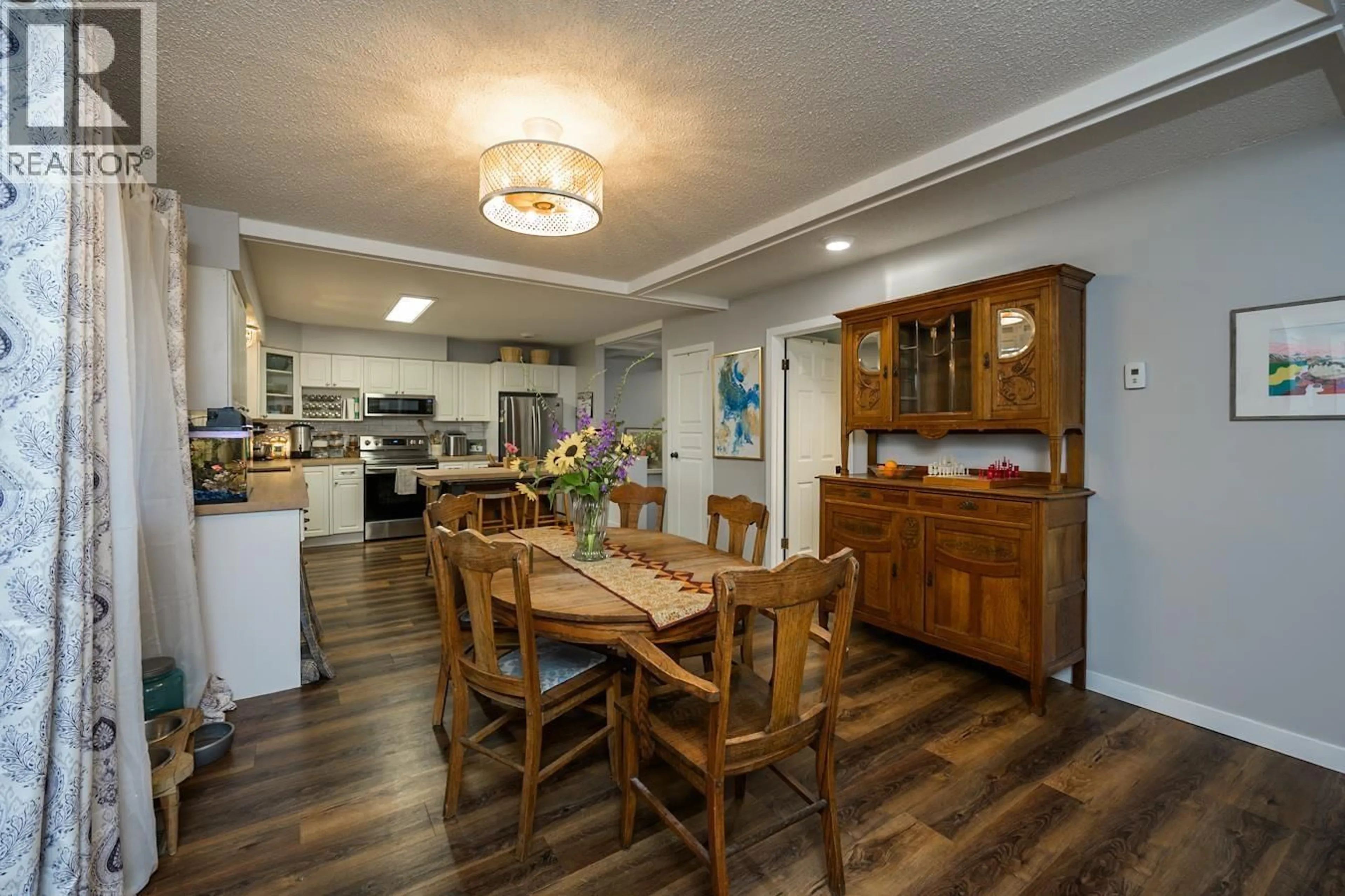 Dining room, wood/laminate floor for 3582 ROSIA ROAD, Prince George British Columbia V2K4Y6