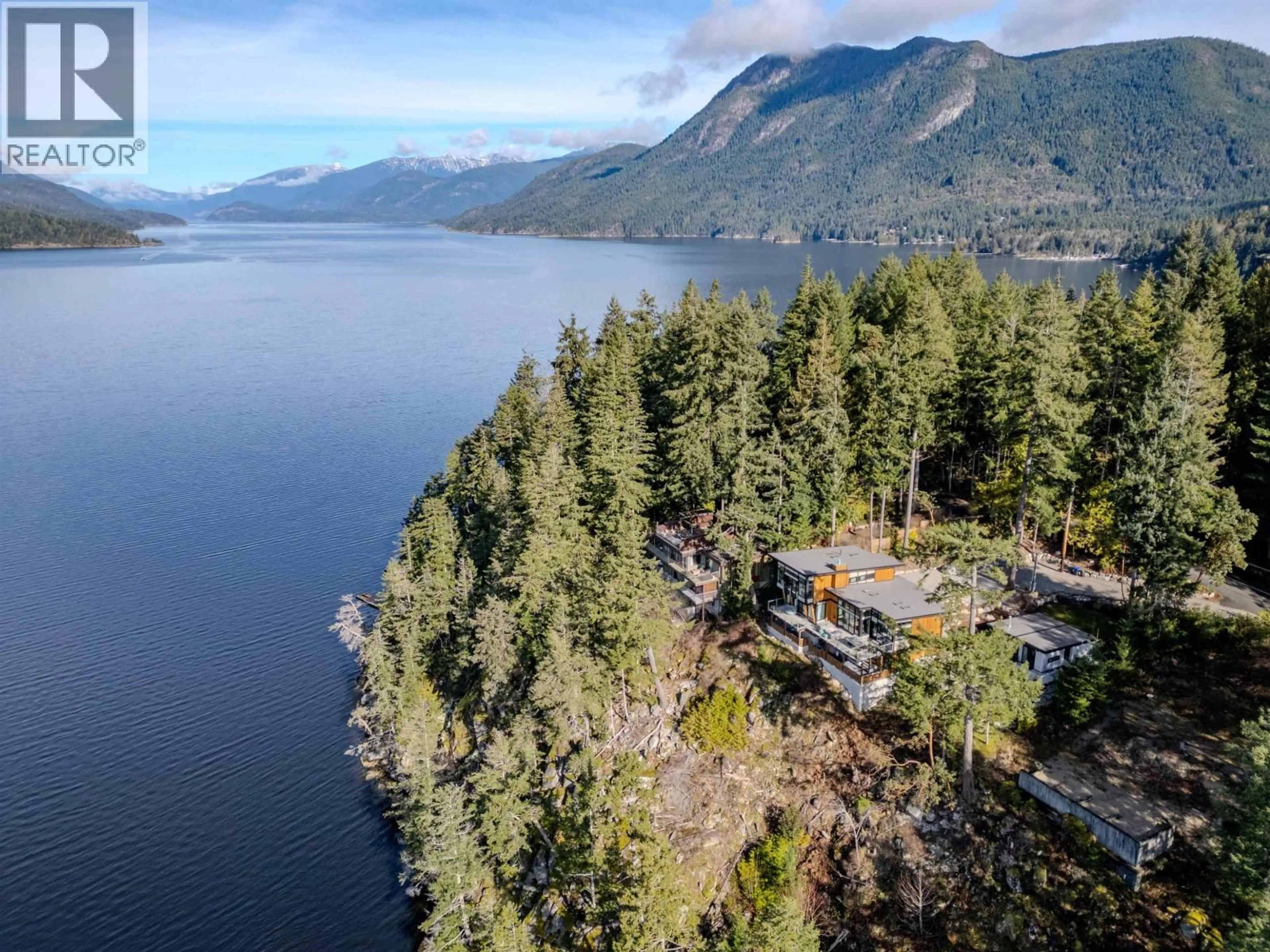 A pic from outside/outdoor area/front of a property/back of a property/a pic from drone, water/lake/river/ocean view for 6101 - -6099 CORACLE DRIVE, Sechelt British Columbia V7Z0C9