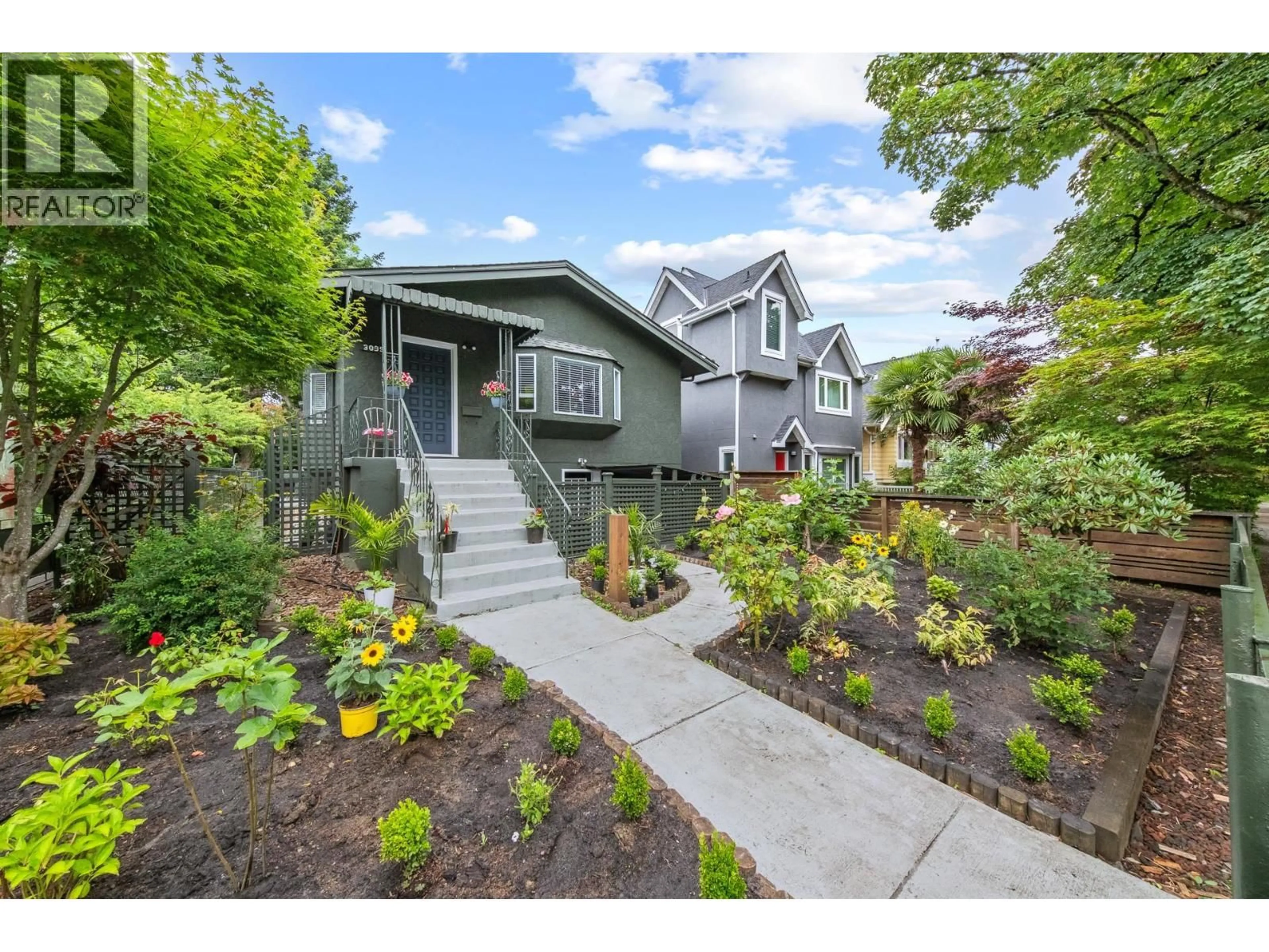 Home with vinyl exterior material, street for 3099 6TH AVENUE, Vancouver British Columbia V6K1X4