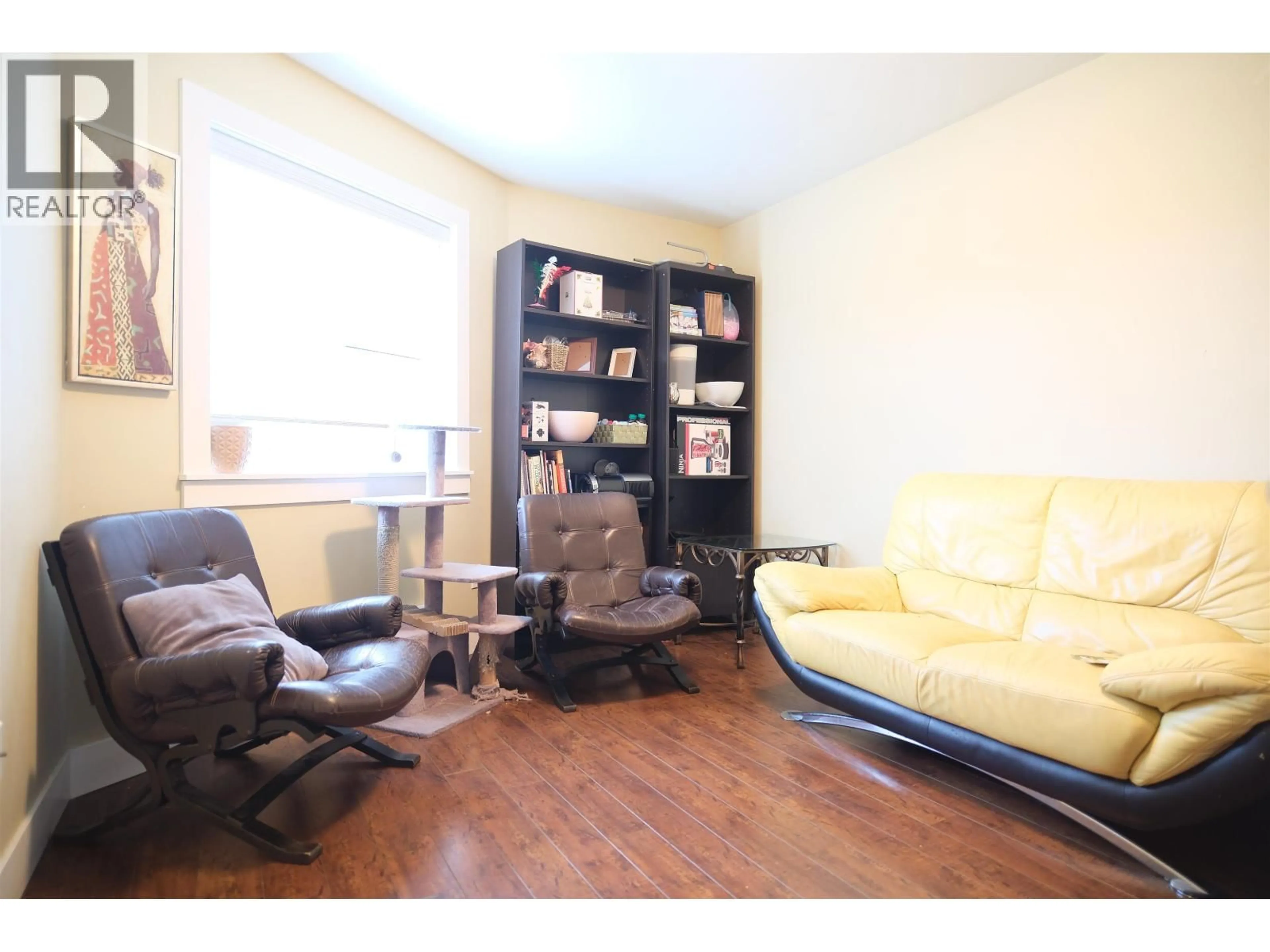 Living room with furniture, wood/laminate floor for 25 - 22977 116 AVENUE, Maple Ridge British Columbia V2X9A8