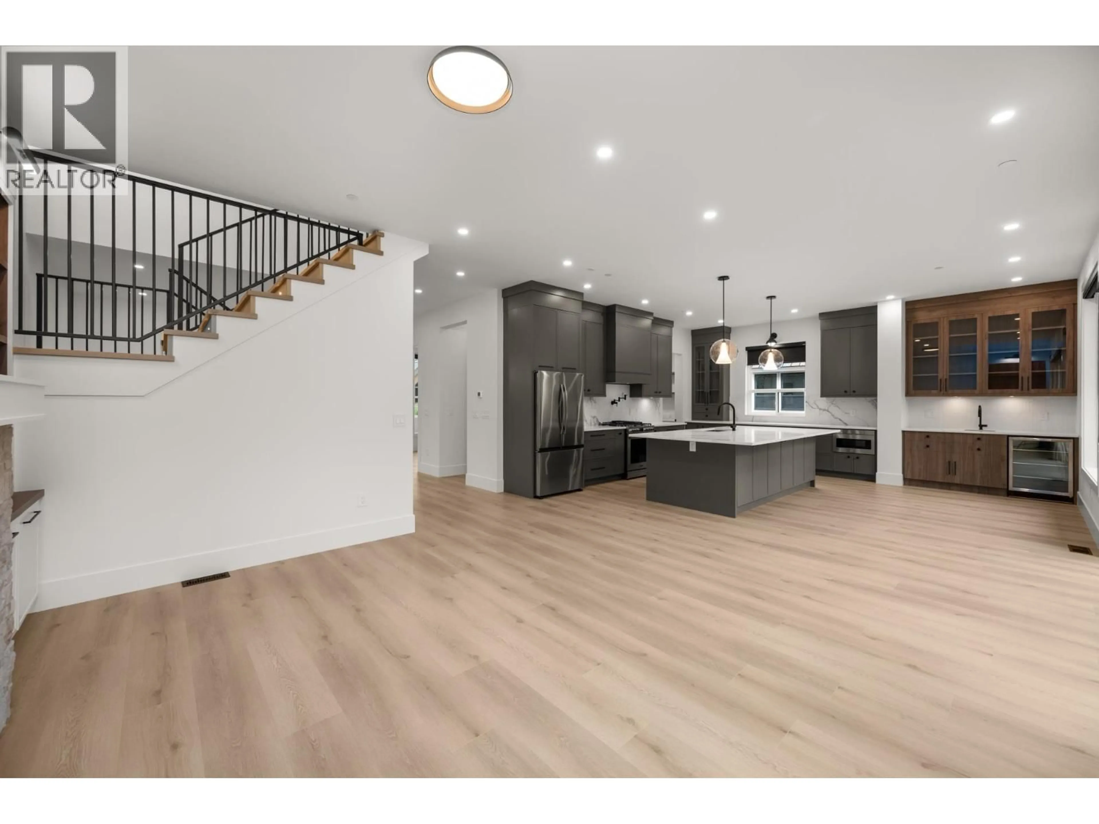 Open concept kitchen, wood/laminate floor for 12868 SHELDRAKE COURT, Maple Ridge British Columbia V4R2R7