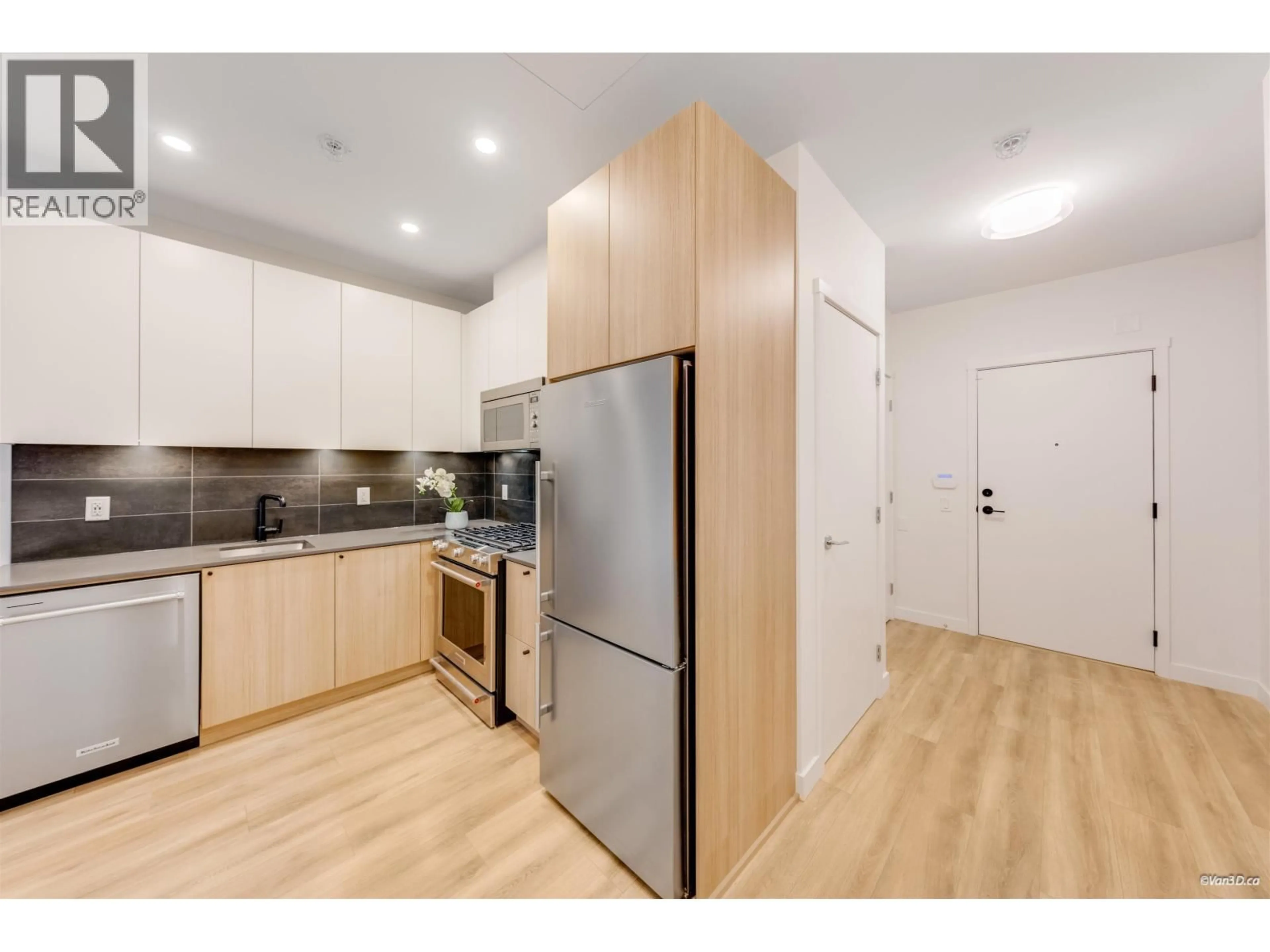 Standard kitchen, wood/laminate floor for 102 - 645 COMO LAKE AVENUE, Coquitlam British Columbia V3J0N9