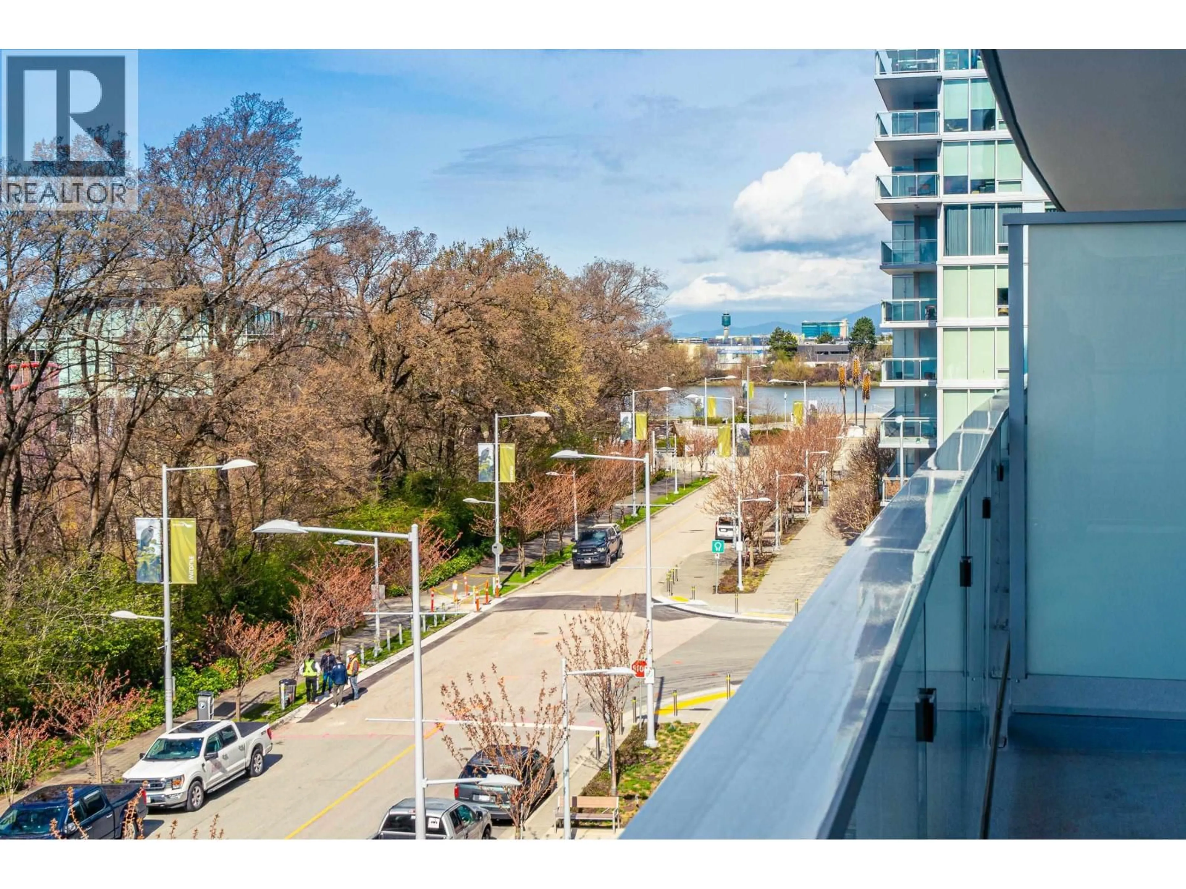 A pic from outside/outdoor area/front of a property/back of a property/a pic from drone, city buildings view from balcony for 706 - 6688 PEARSON WAY, Richmond British Columbia V7C0E5