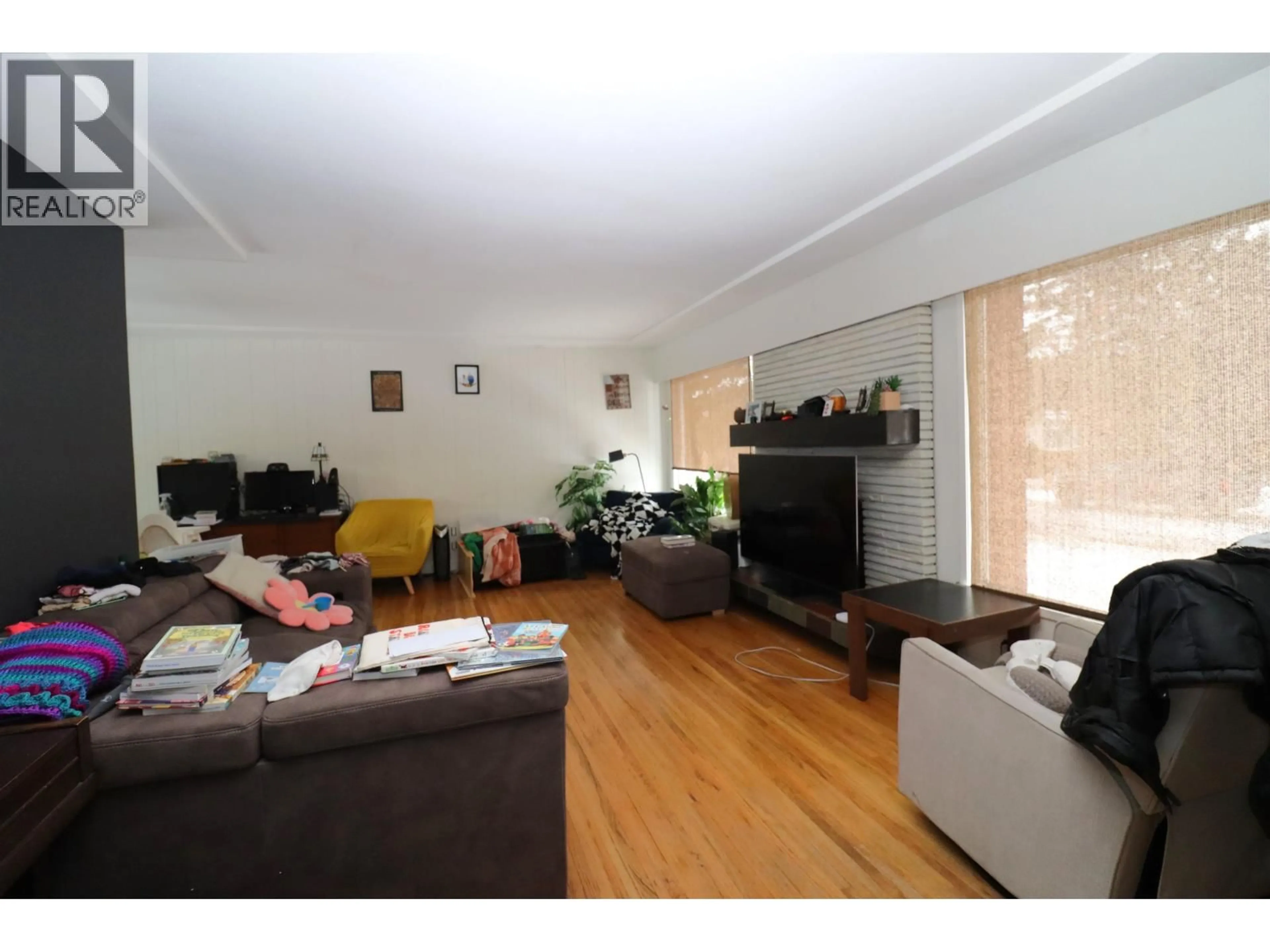 Living room with furniture, wood/laminate floor for 153 GILLETT STREET, Prince George British Columbia V2M2T1