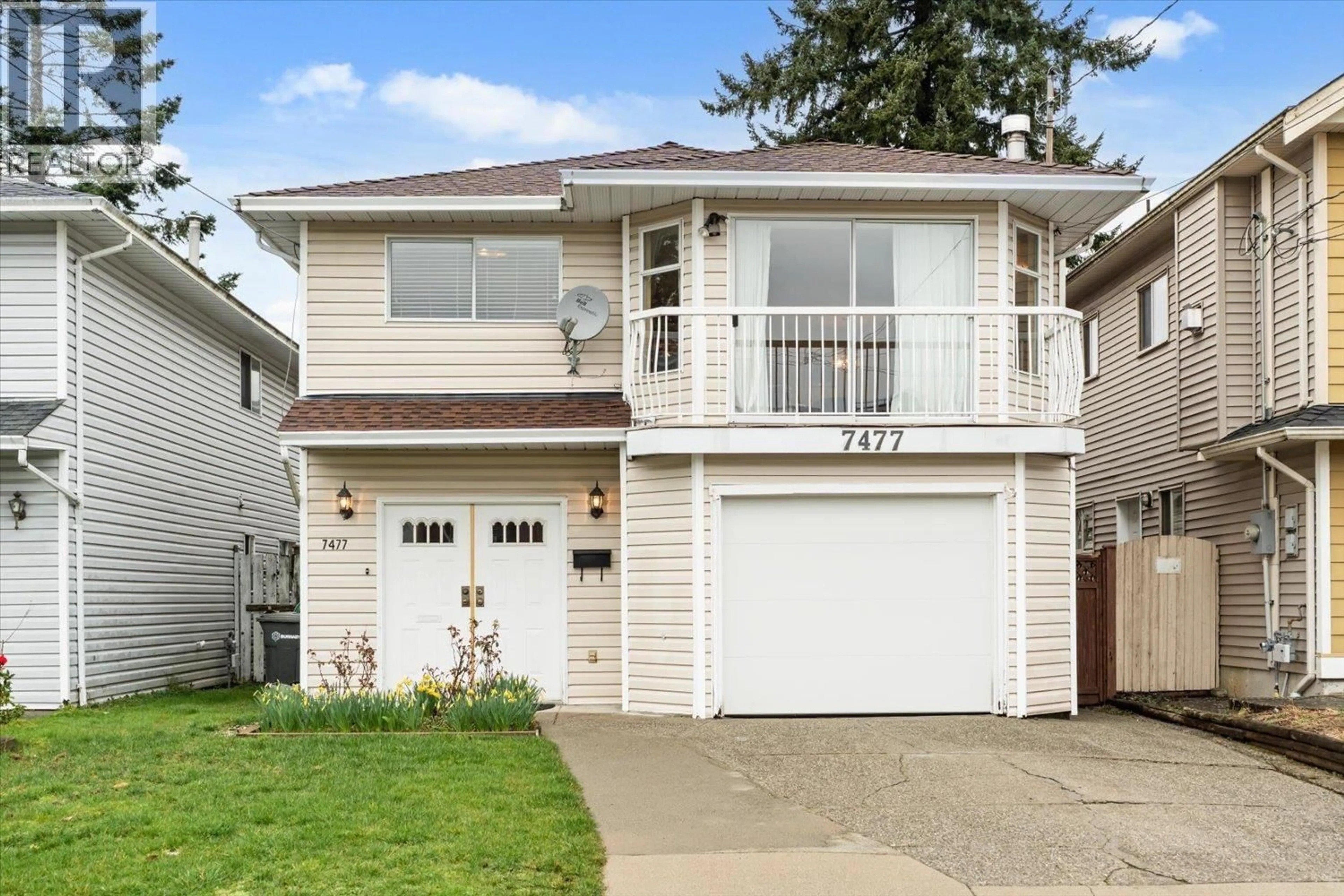 Home with vinyl exterior material, street for 7477 19TH AVENUE, Burnaby British Columbia V3N1E5