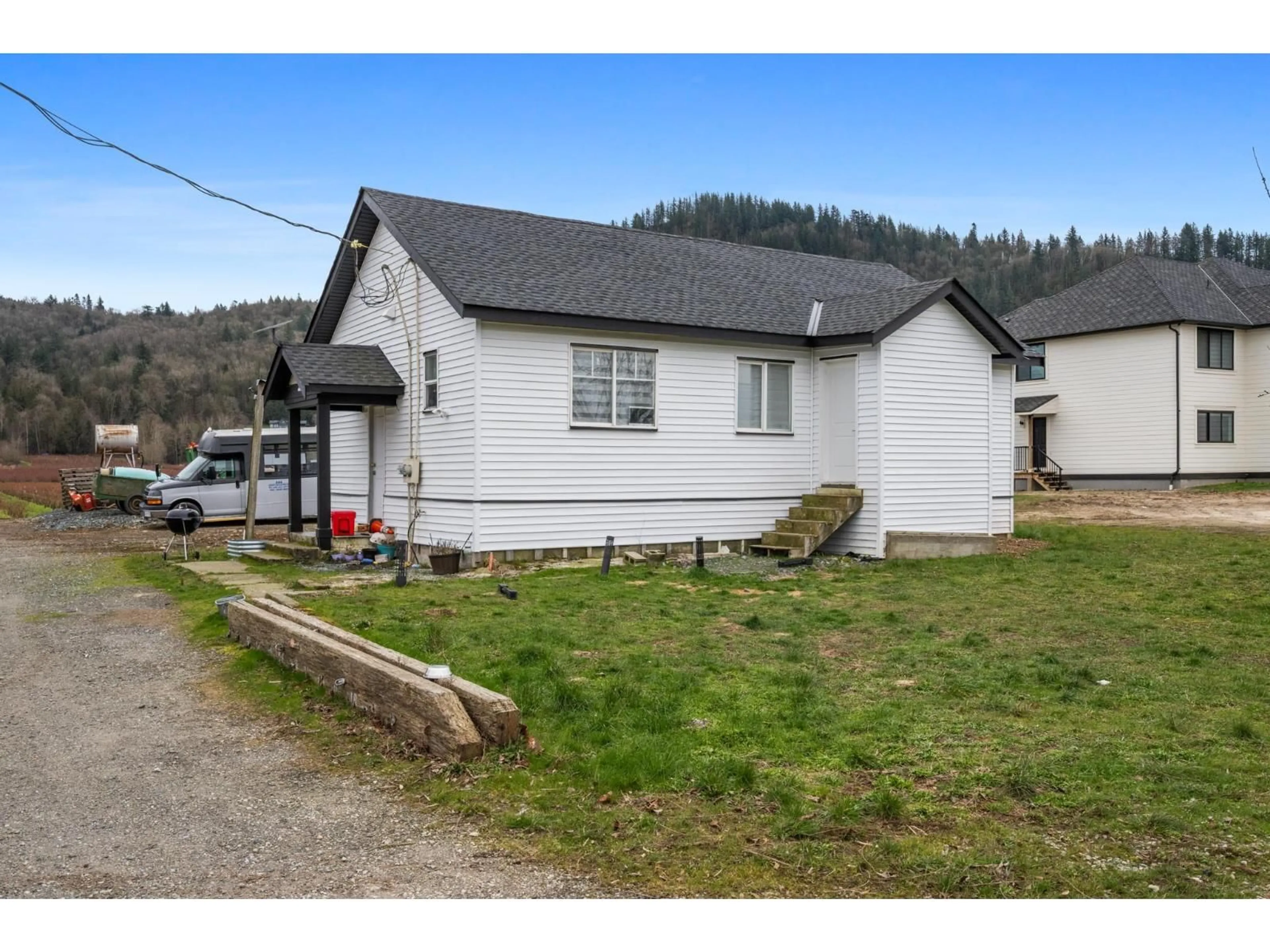 A pic from outside/outdoor area/front of a property/back of a property/a pic from drone, street for 5390 BEHARRELL ROAD, Abbotsford British Columbia V3G1P8