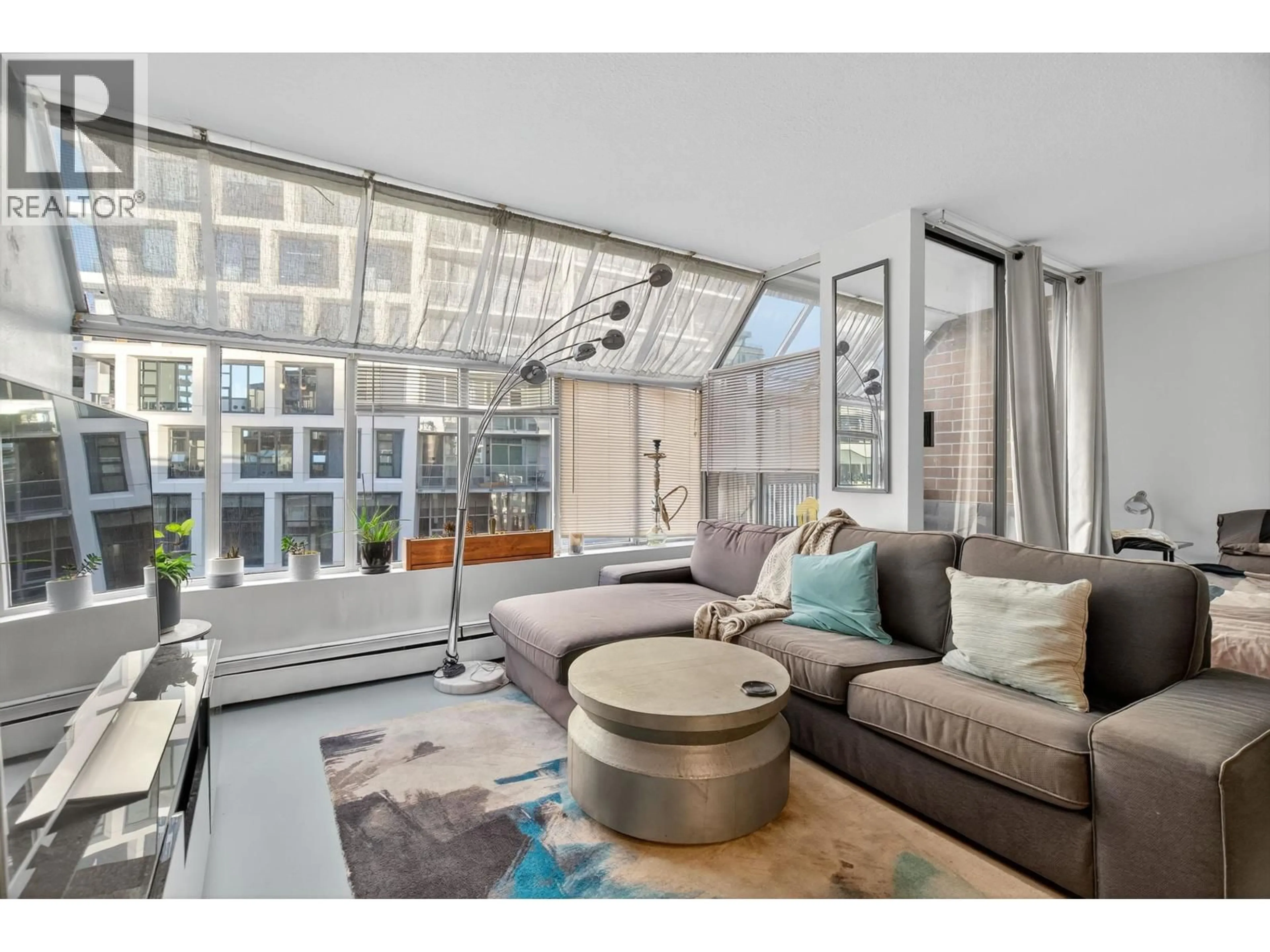 Living room with furniture, unknown for 902 - 950 DRAKE STREET, Vancouver British Columbia V6Z2B9