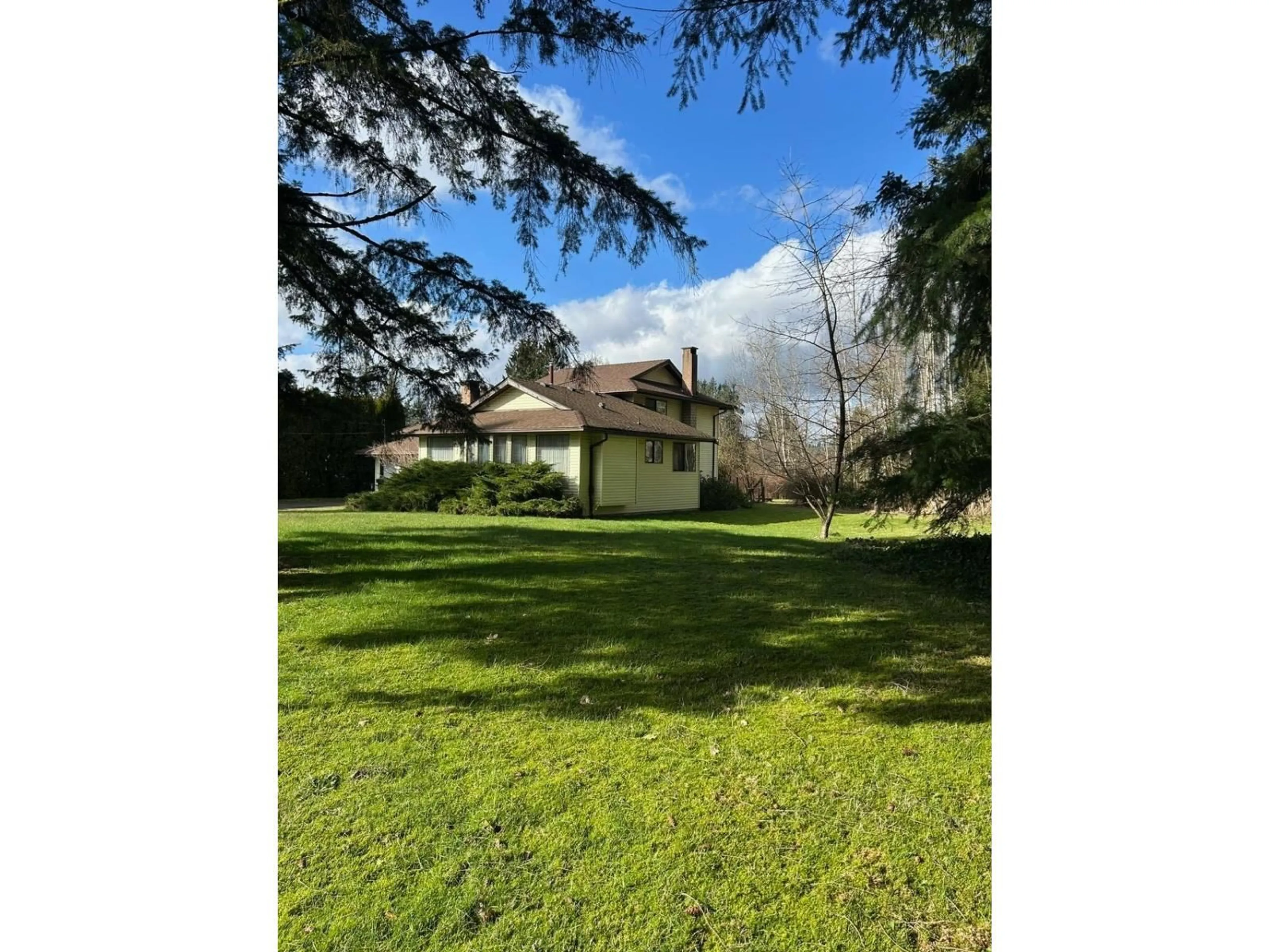 A pic from outside/outdoor area/front of a property/back of a property/a pic from drone, forest/trees view for 24765 50 AVENUE, Langley British Columbia V2Z1E4