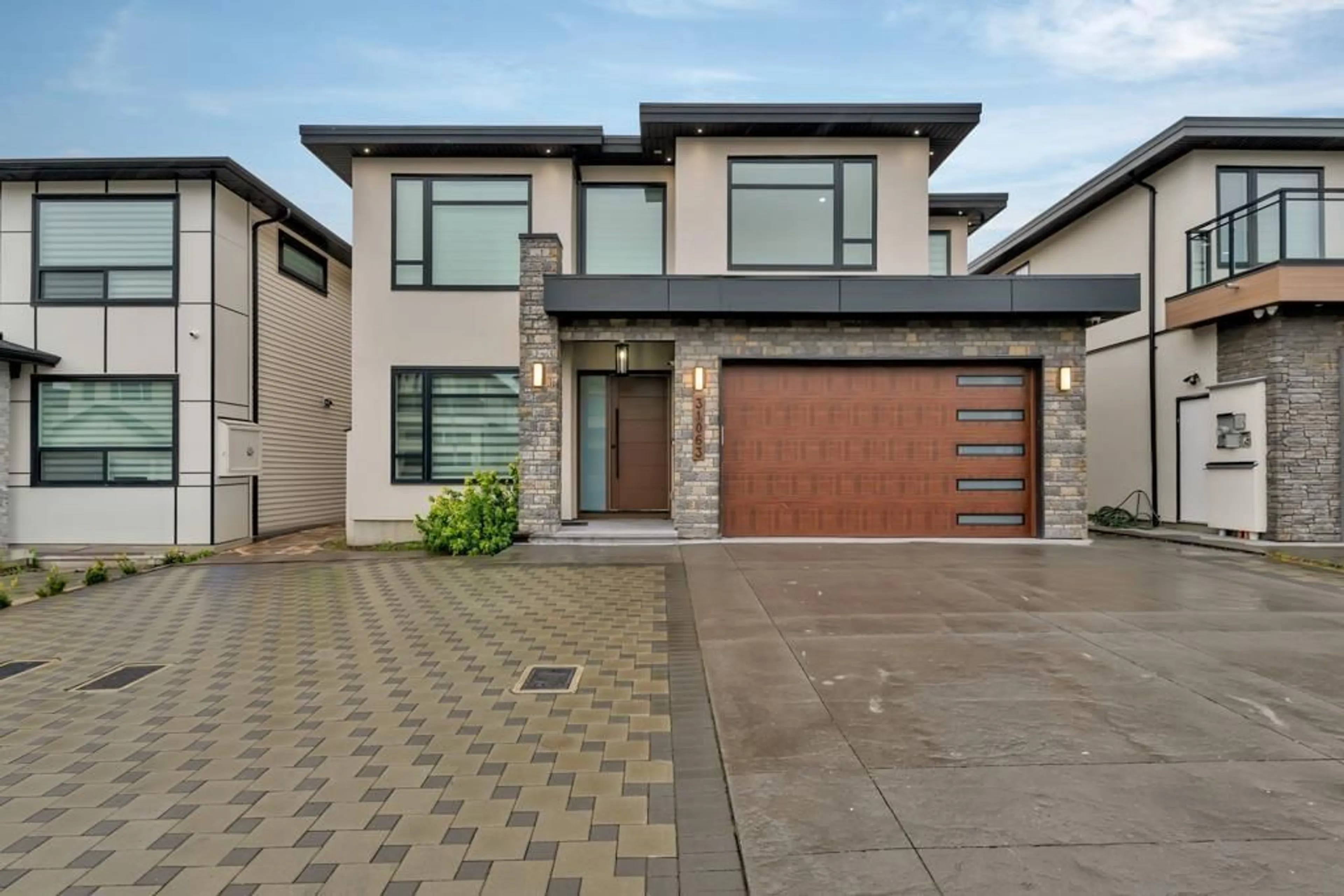 Home with brick exterior material, street for 31063 DEERTRAIL DRIVE NORTH, Abbotsford British Columbia V2T5J5