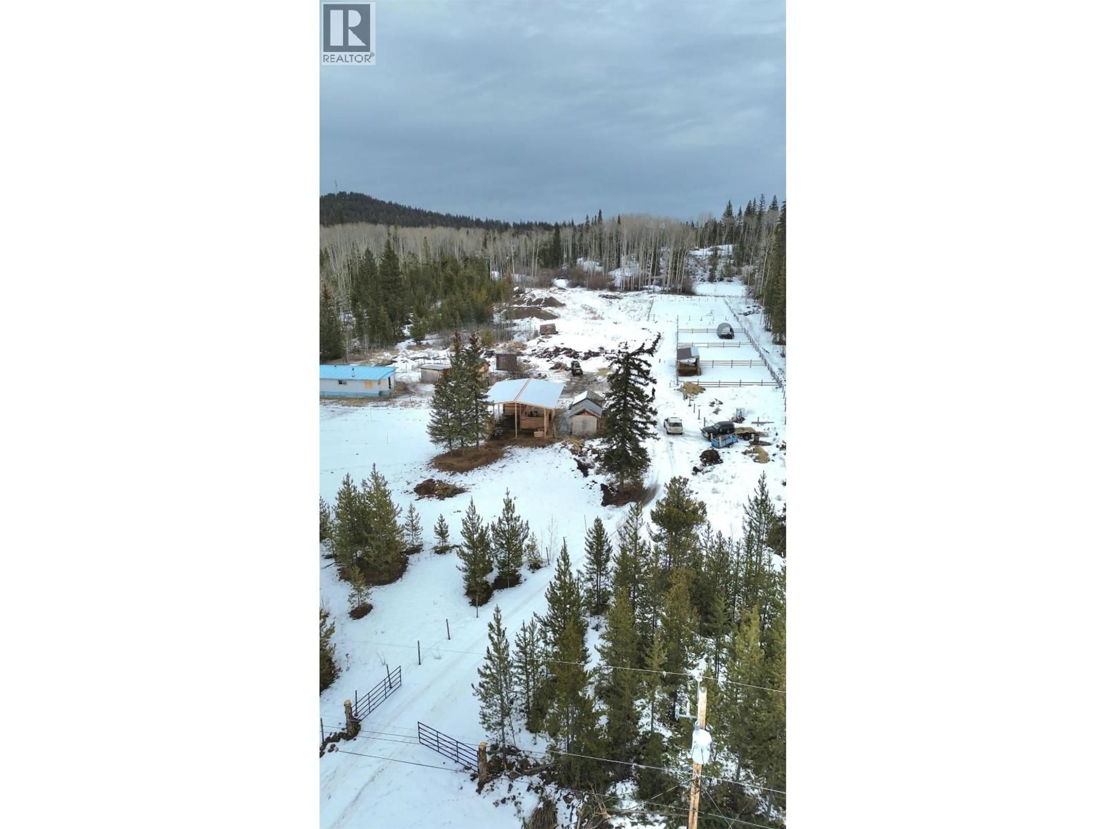 A pic from outside/outdoor area/front of a property/back of a property/a pic from drone, forest/trees view for 7037 HOLMES ROAD, Lone Butte British Columbia V0K1X1