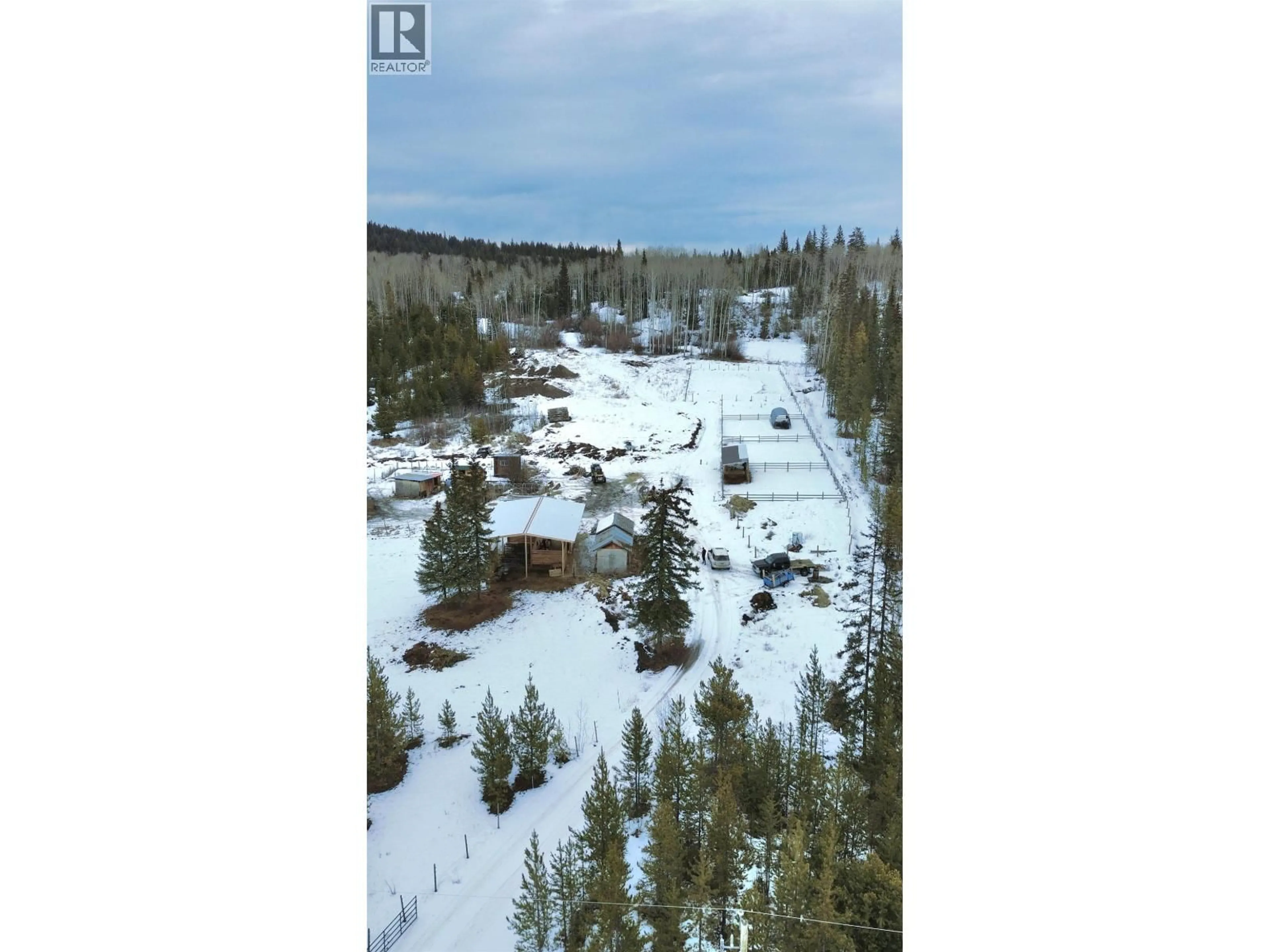 A pic from outside/outdoor area/front of a property/back of a property/a pic from drone, forest/trees view for 7037 HOLMES ROAD, Lone Butte British Columbia V0K1X1
