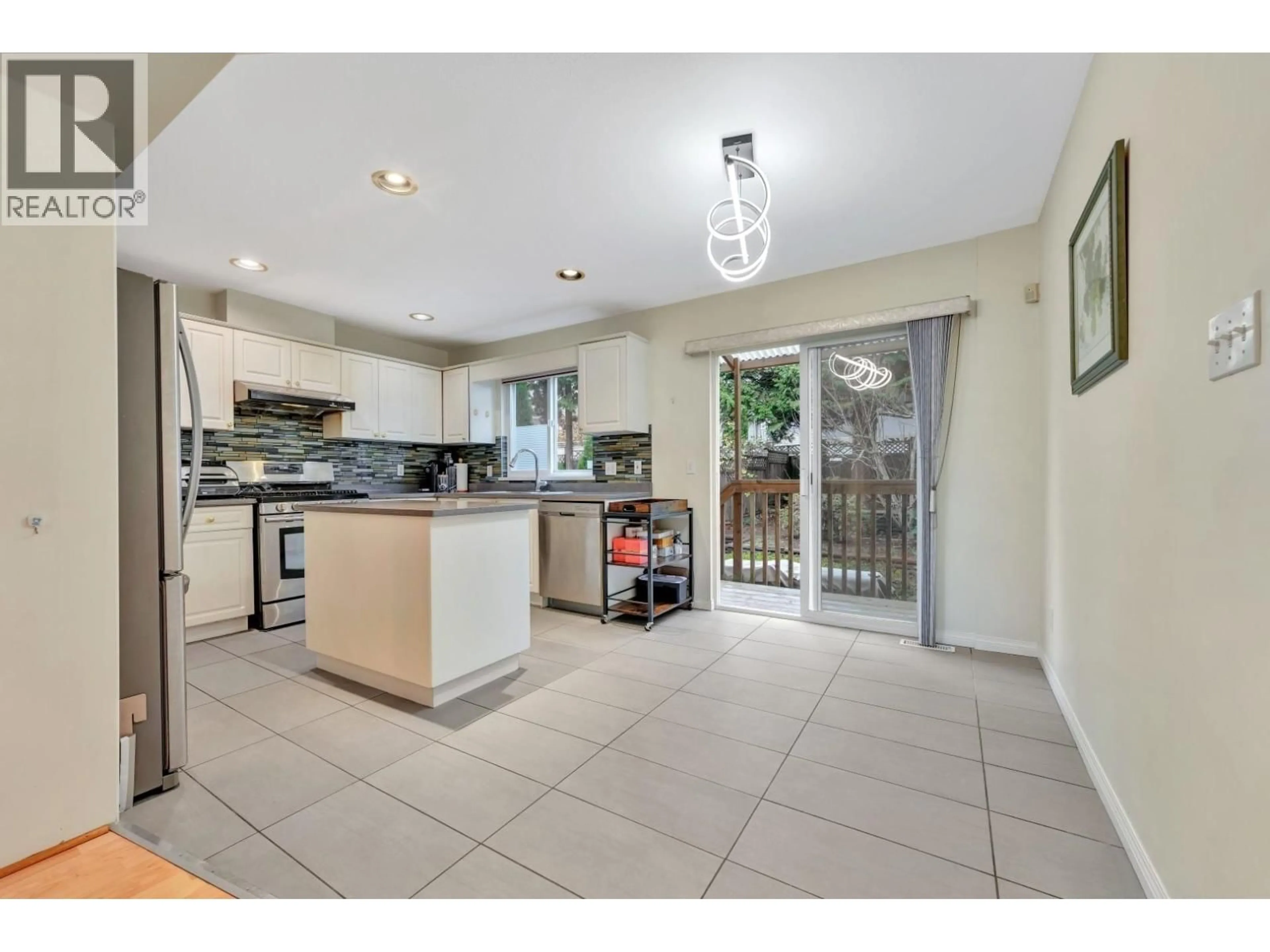 Open concept kitchen, ceramic/tile floor for 1067 DANSEY AVENUE, Coquitlam British Columbia V3K3H2