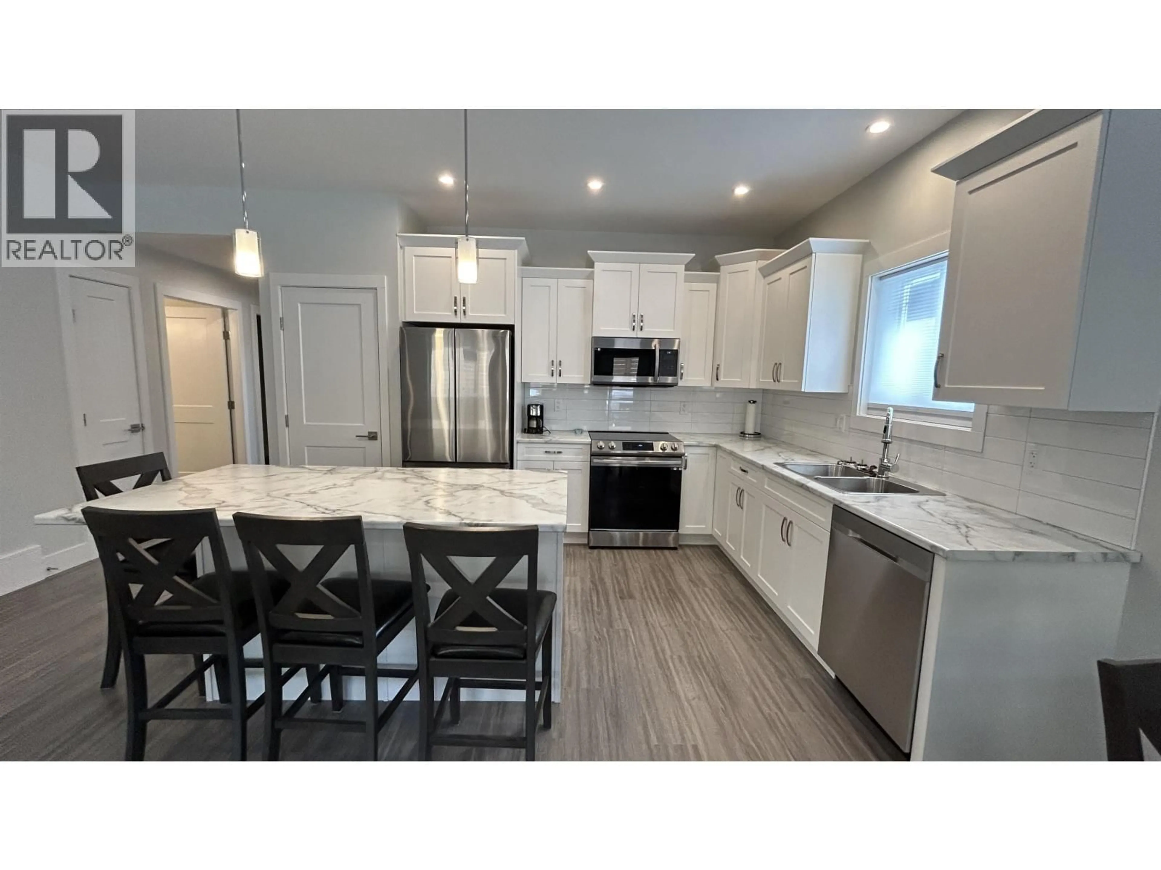Open concept kitchen, unknown for 17 - 105 FOREST RIDGE ROAD, 100 Mile House British Columbia V0K2E0