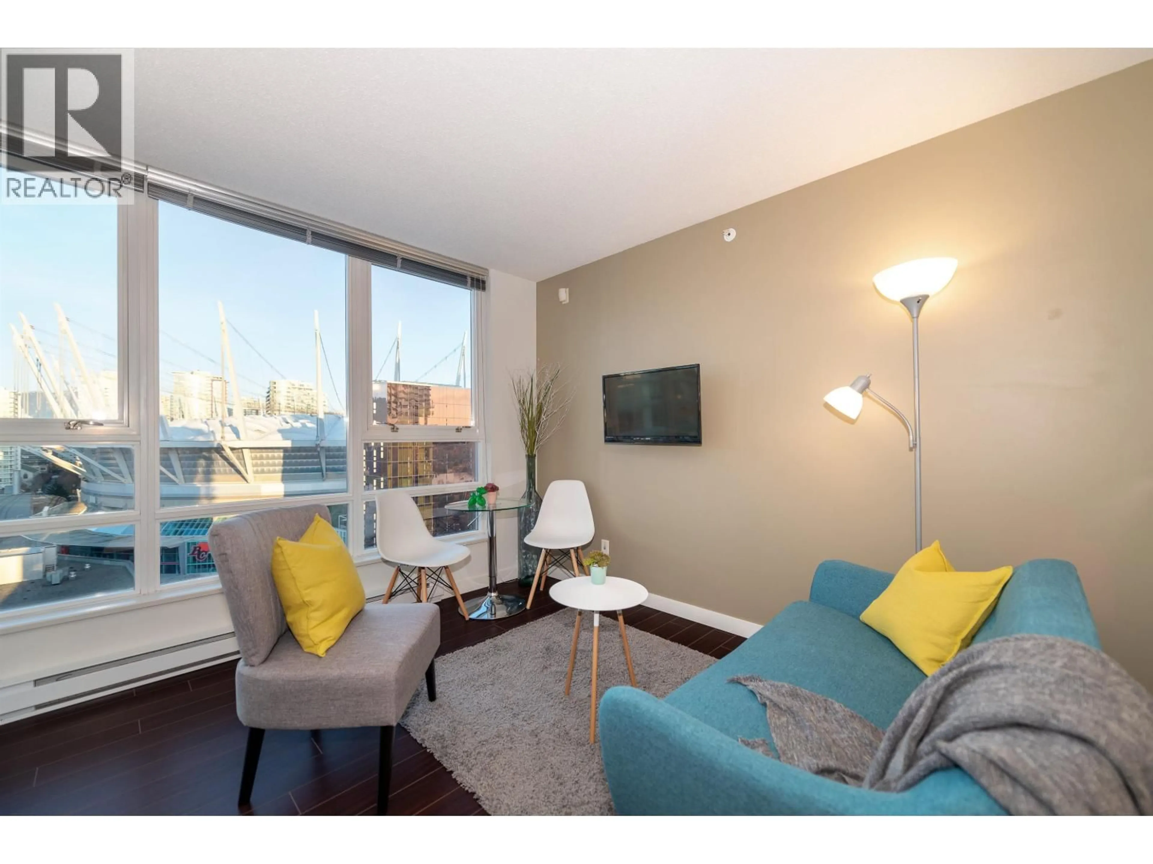 Living room with furniture, wood/laminate floor for 2106 - 939 EXPO BOULEVARD, Vancouver British Columbia V6Z3G7