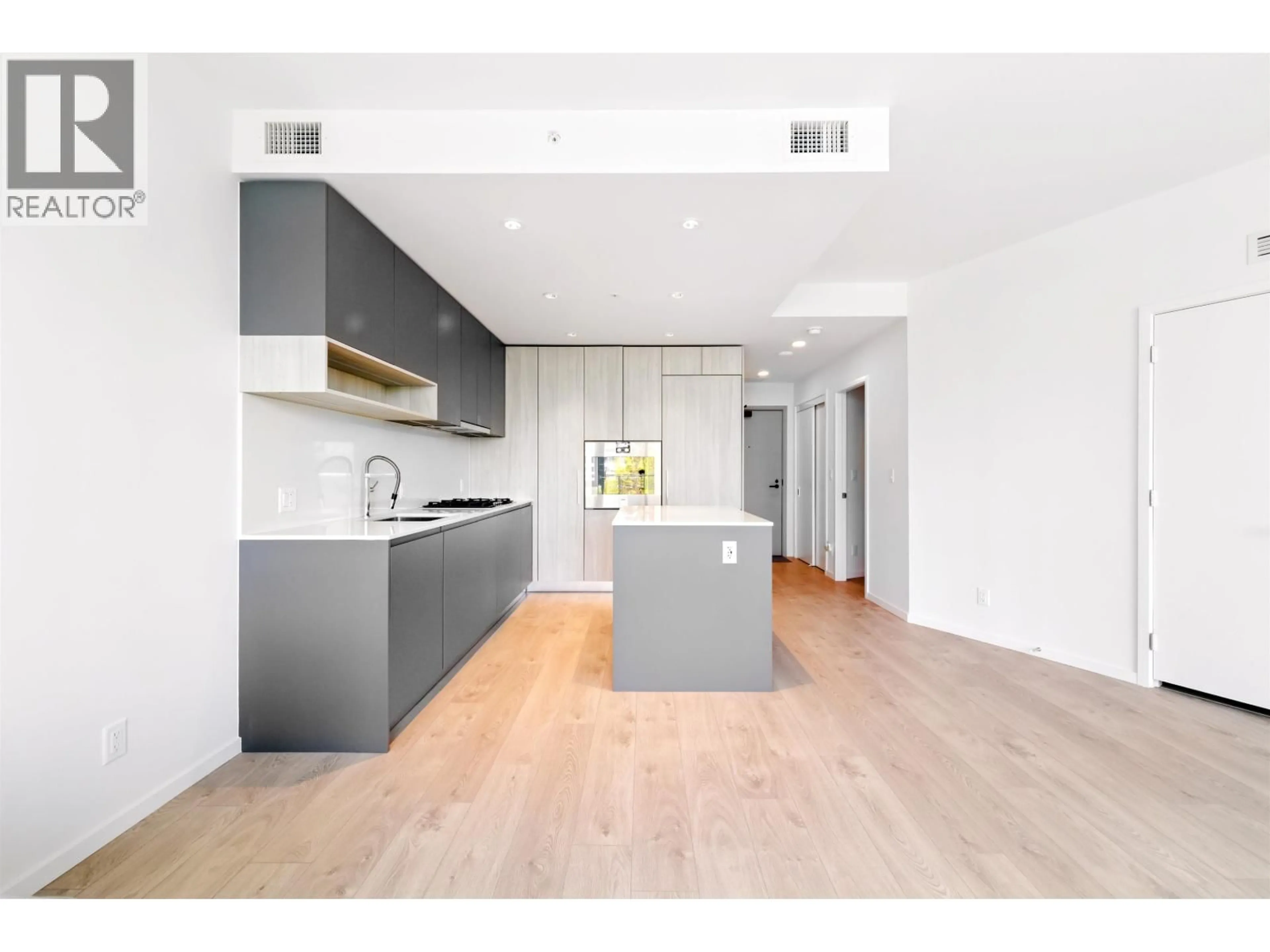 Open concept kitchen, wood/laminate floor for 422 - 6808 MINORU BOULEVARD, Richmond British Columbia V6Y0M7