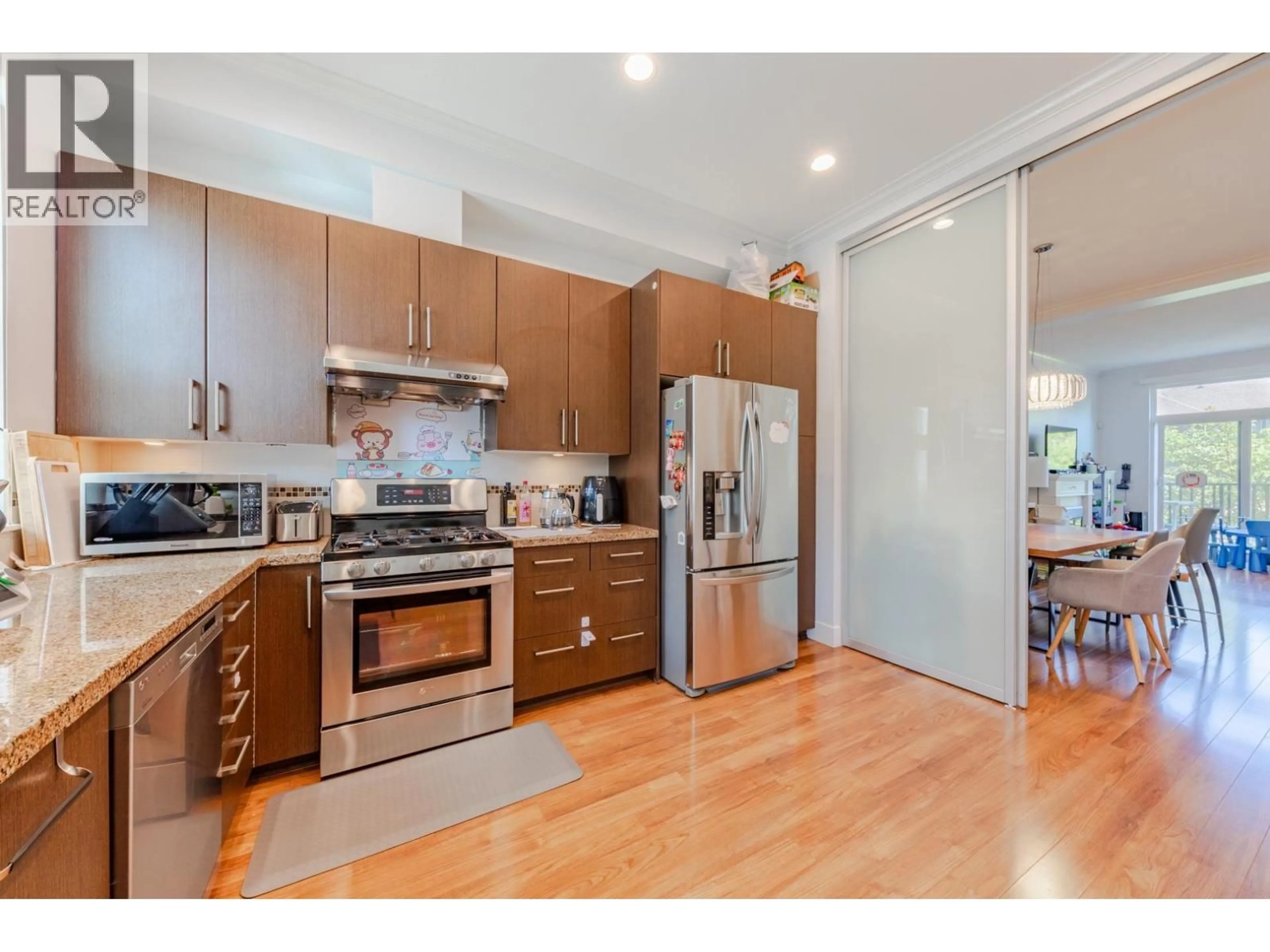 Open concept kitchen, wood/laminate floor for 21 - 9651 ALBERTA ROAD, Richmond British Columbia V6Y1T7