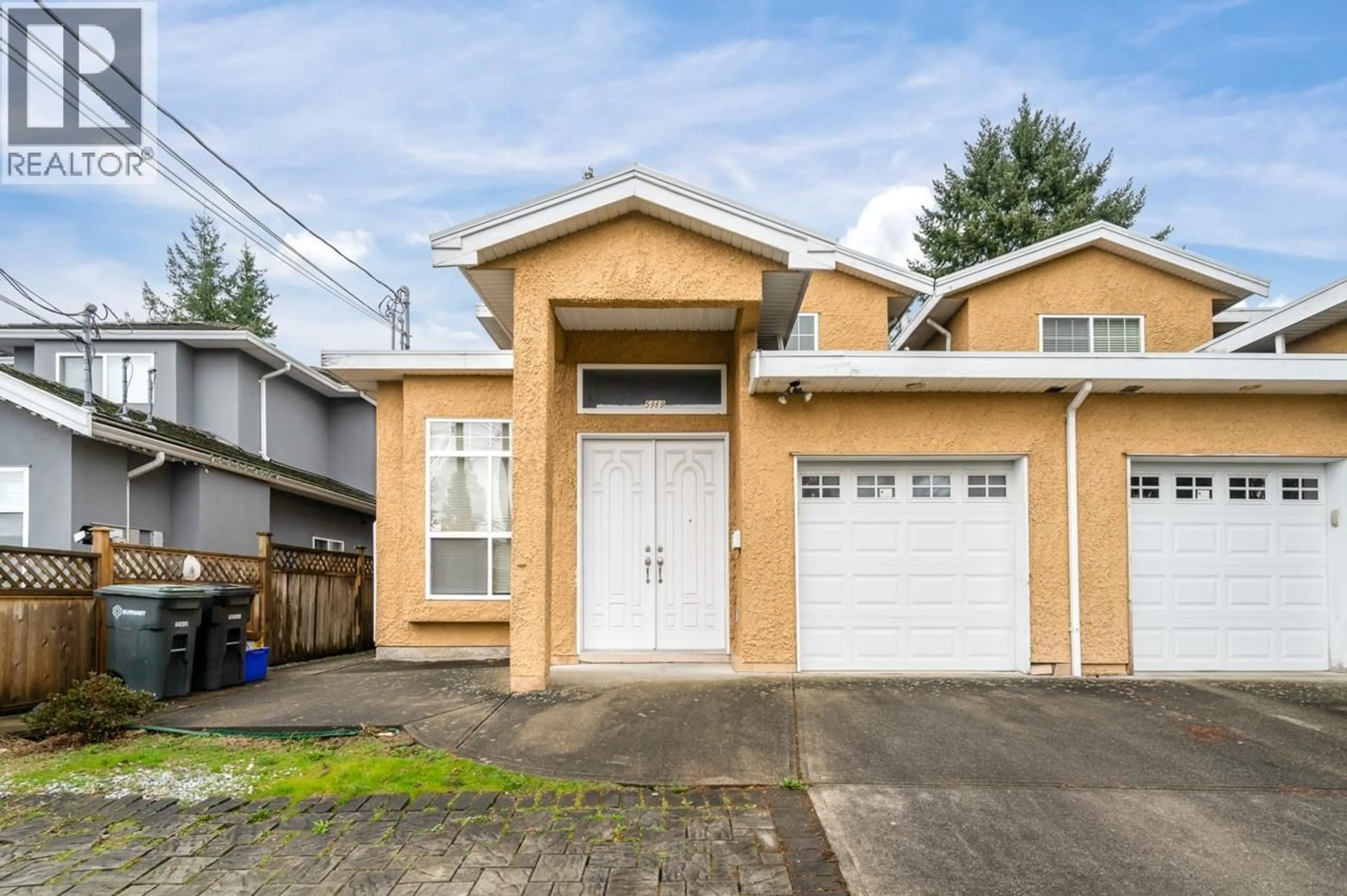 Home with vinyl exterior material, street for 5989 RUMBLE STREET, Burnaby British Columbia V5J2C6