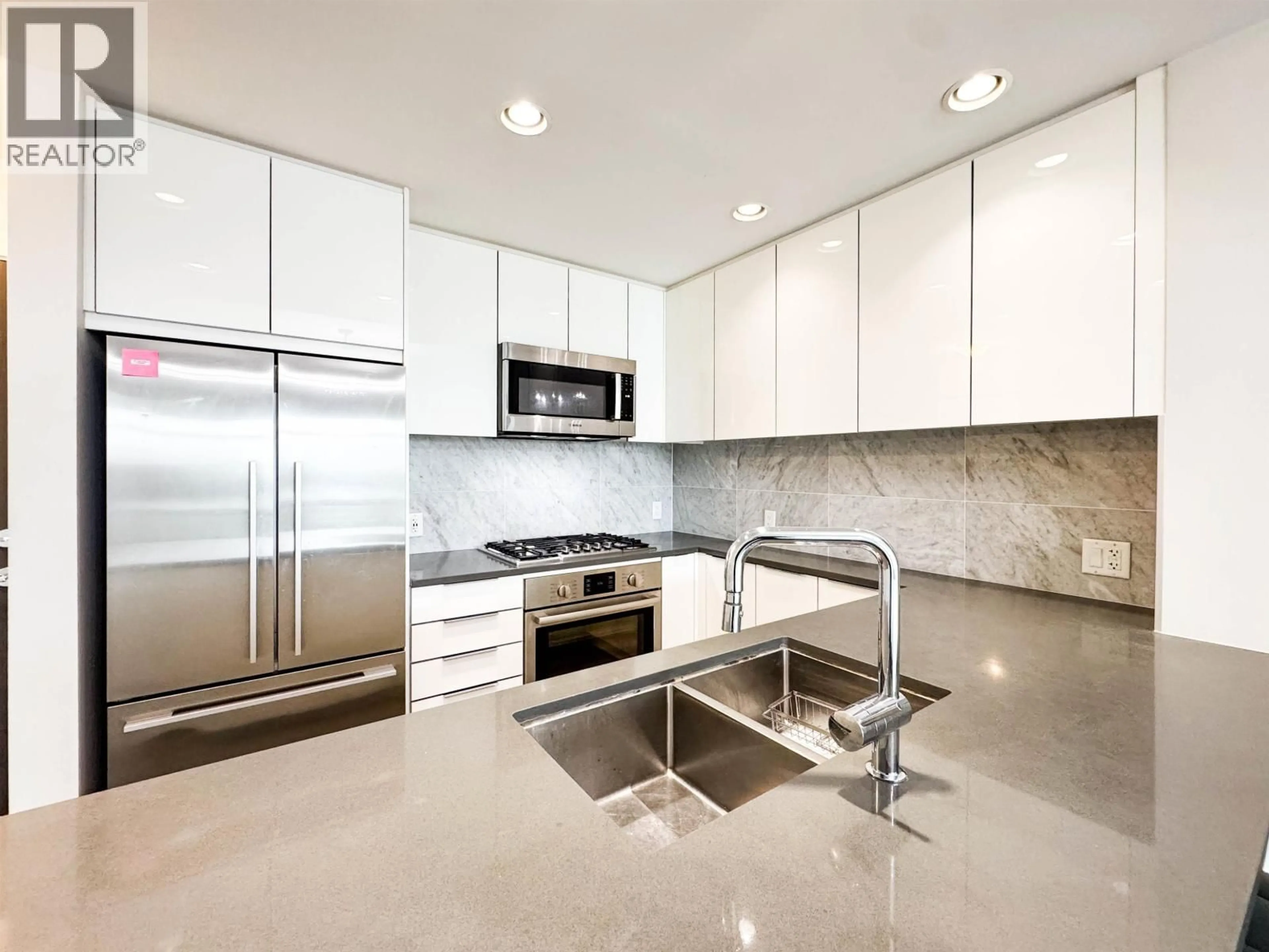 Contemporary kitchen, ceramic/tile floor for 404 - 3289 RIVERWALK AVENUE, Vancouver British Columbia V5S0G2