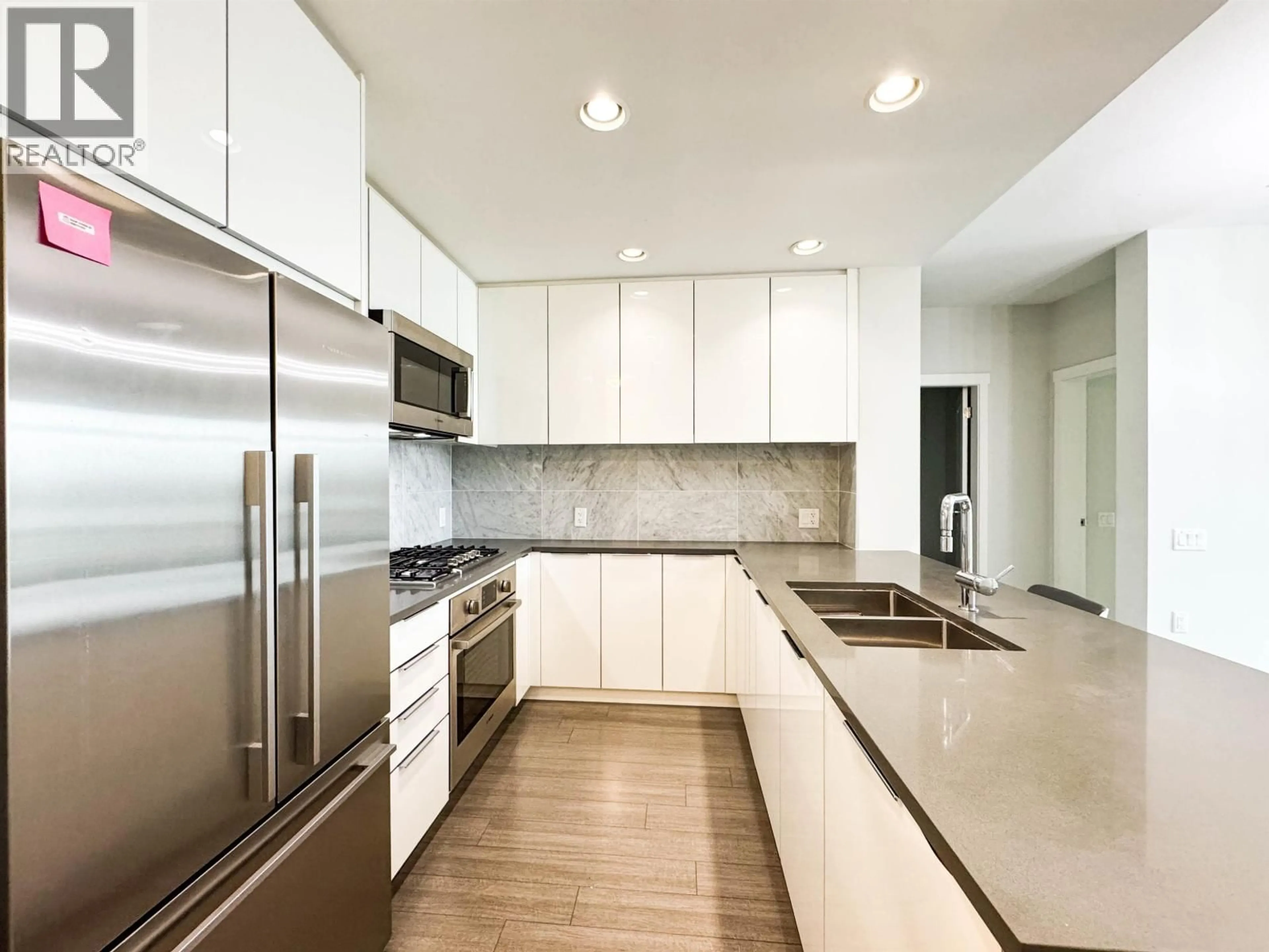 Contemporary kitchen, ceramic/tile floor for 404 - 3289 RIVERWALK AVENUE, Vancouver British Columbia V5S0G2
