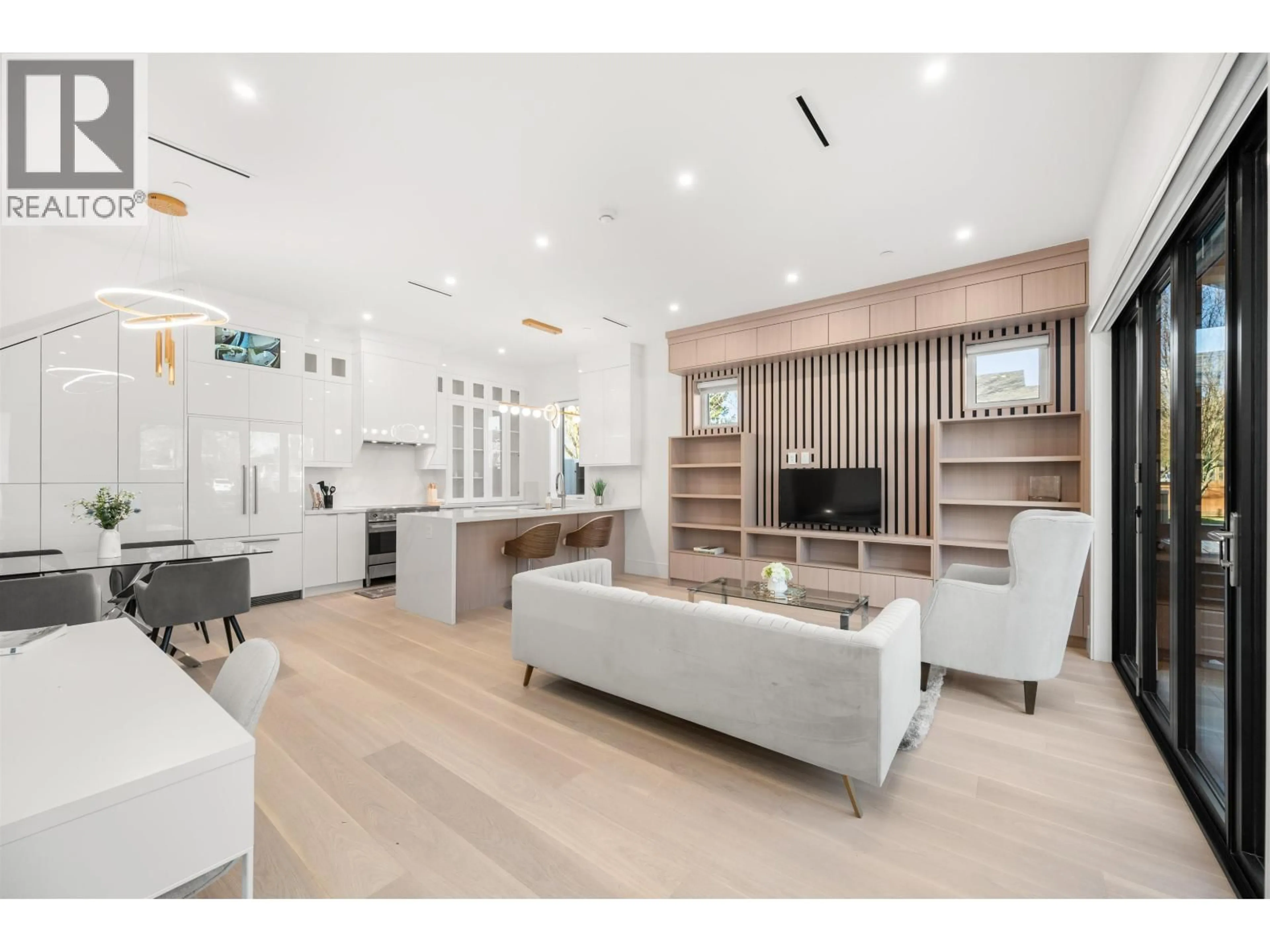 Living room with furniture, wood/laminate floor for 6307 CHESTER STREET, Vancouver British Columbia V5W3C4