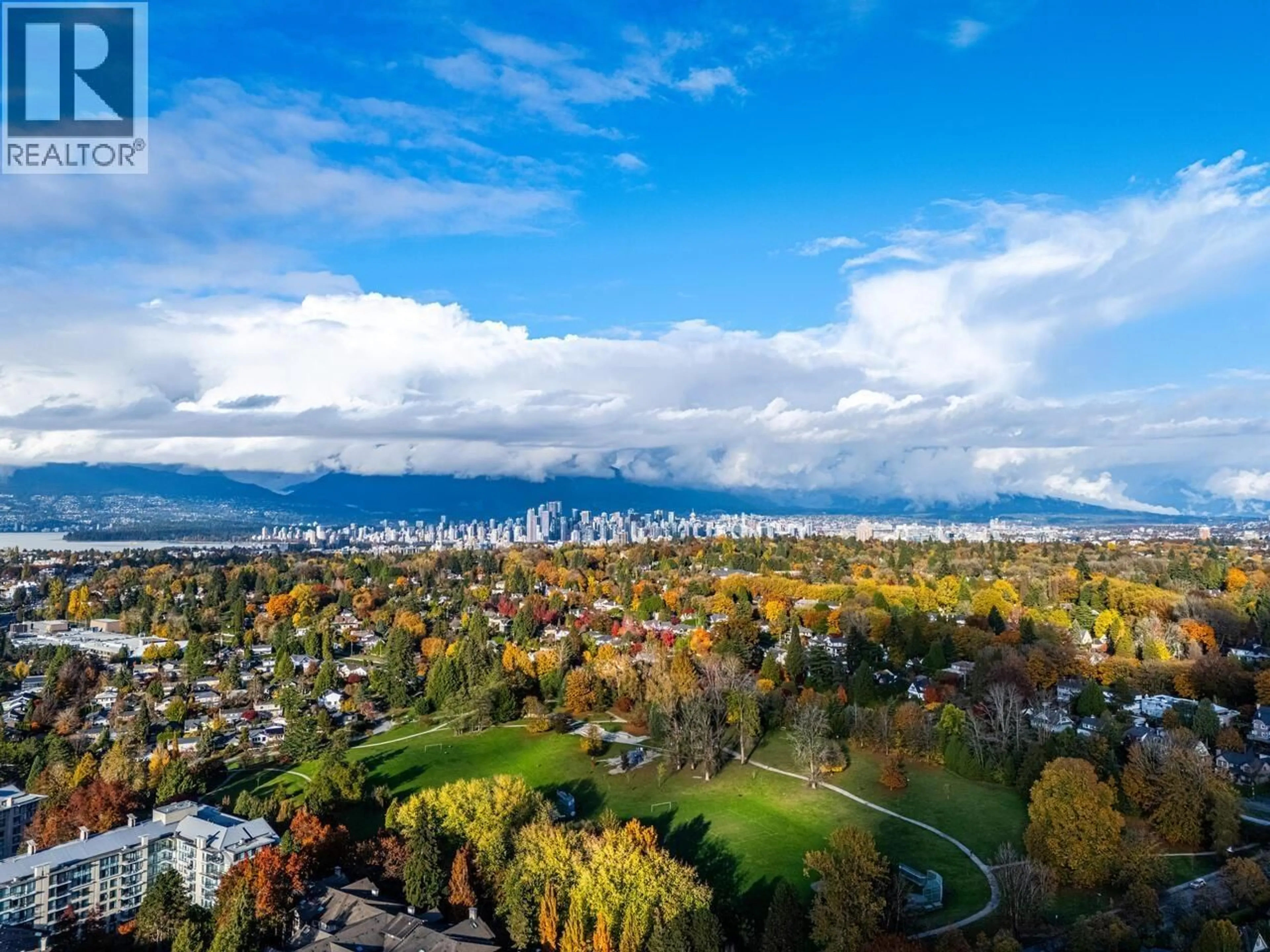 A pic from outside/outdoor area/front of a property/back of a property/a pic from drone, mountain view for 1987 35TH AVENUE, Vancouver British Columbia V6M1H8