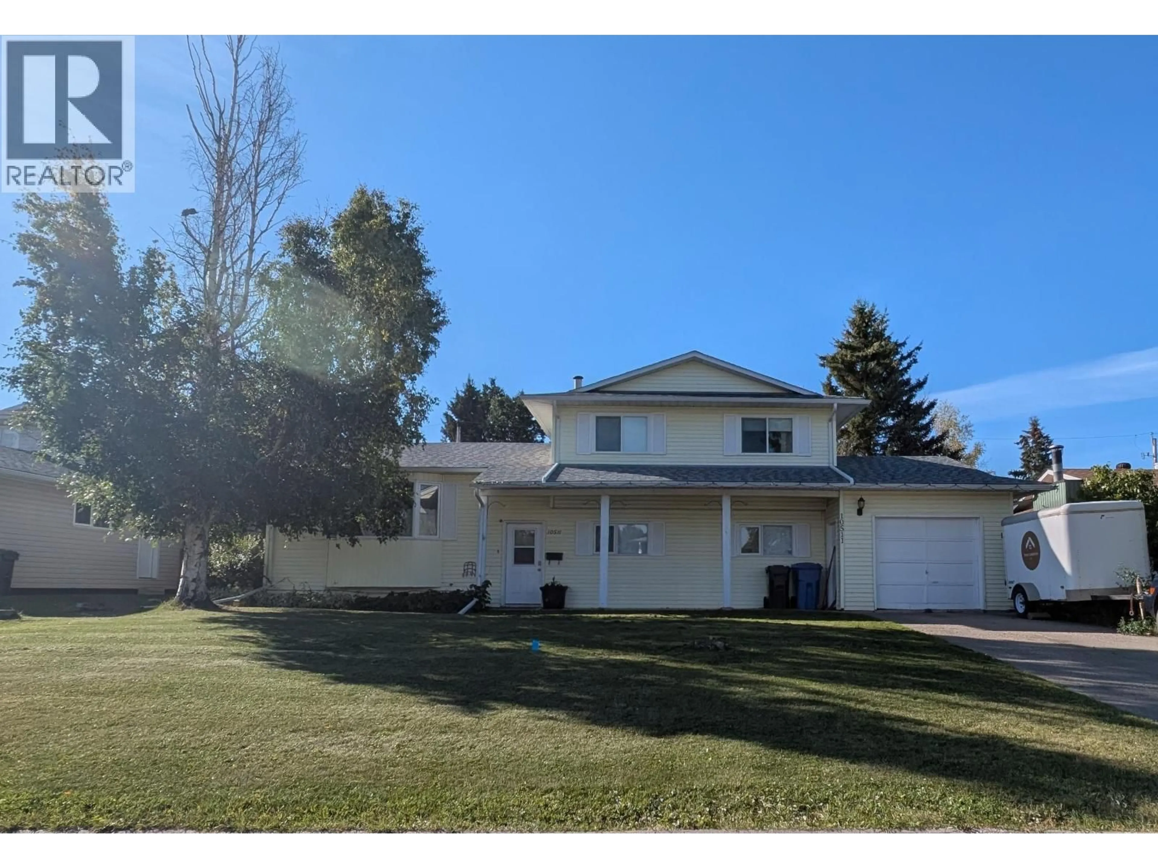 A pic from outside/outdoor area/front of a property/back of a property/a pic from drone, street for 10511 113 AVENUE, Fort St. John British Columbia V2K1T2