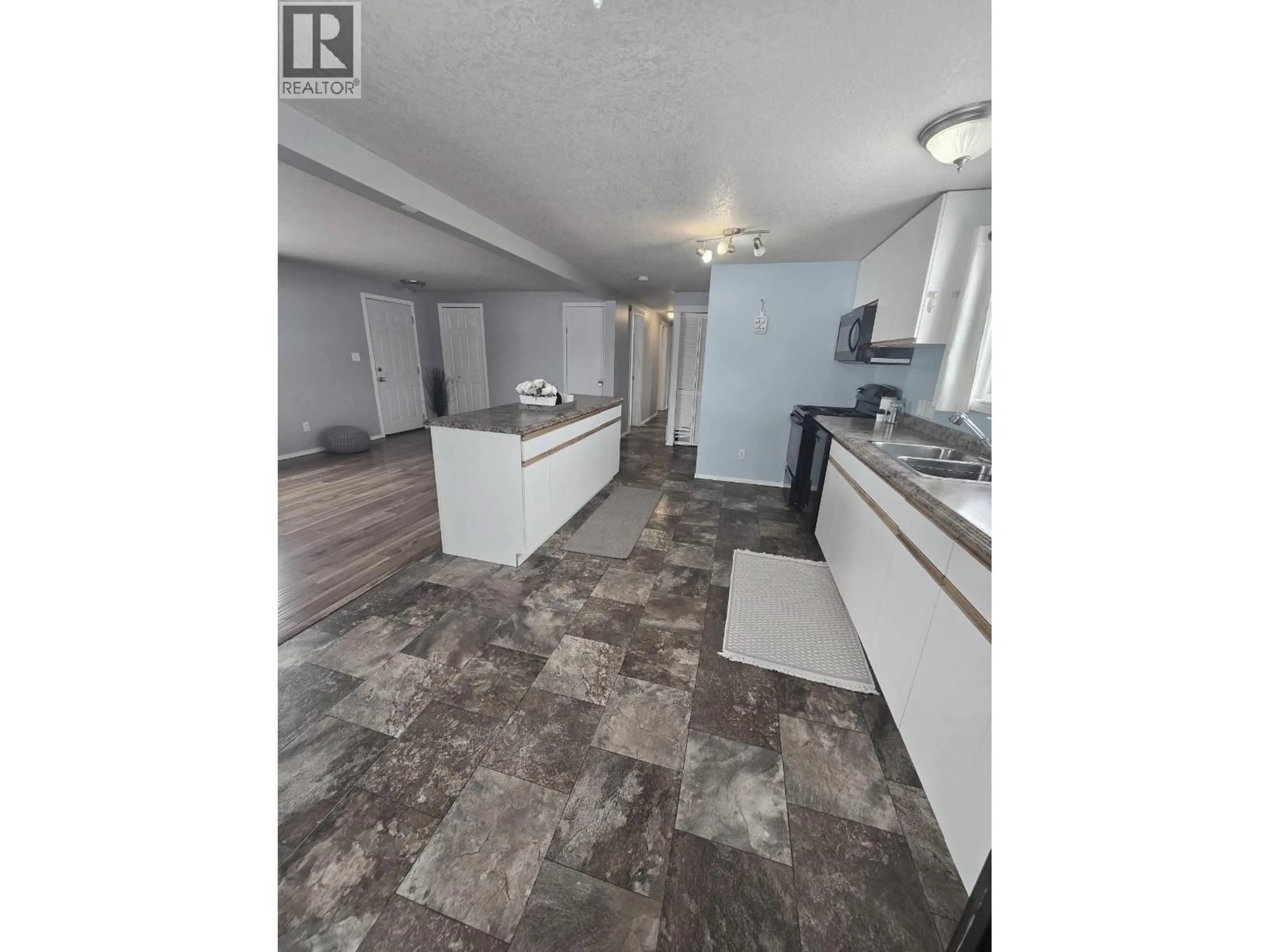Open concept kitchen, unknown for 9223 77 STREET, Fort St. John British Columbia V1J3A8