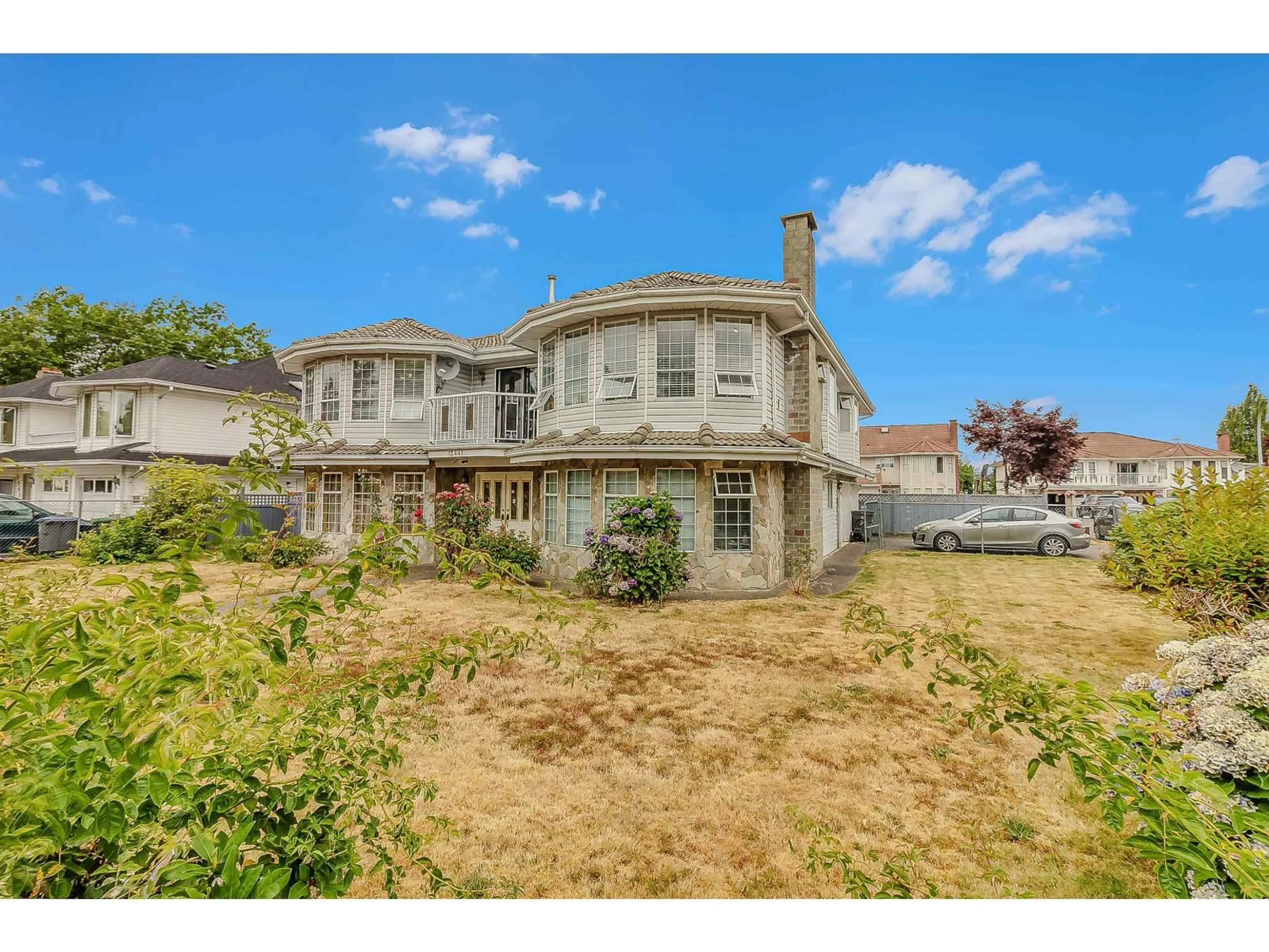 A pic from outside/outdoor area/front of a property/back of a property/a pic from drone, street for 12441 71A AVENUE, Surrey British Columbia V3W0P7