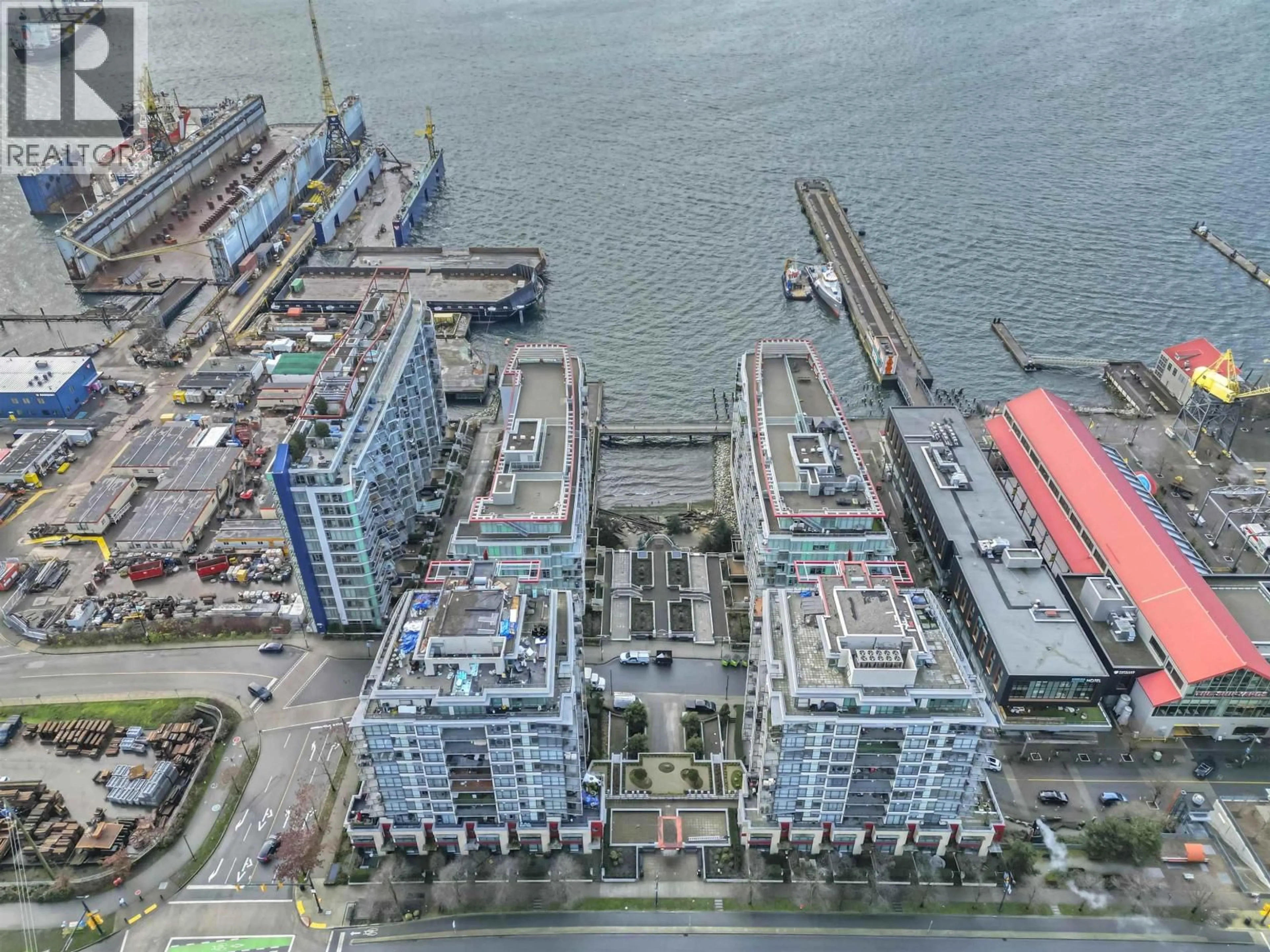 A pic from outside/outdoor area/front of a property/back of a property/a pic from drone, city buildings view from balcony for 1102 - 172 VICTORY SHIP WAY, North Vancouver British Columbia V7L0B5