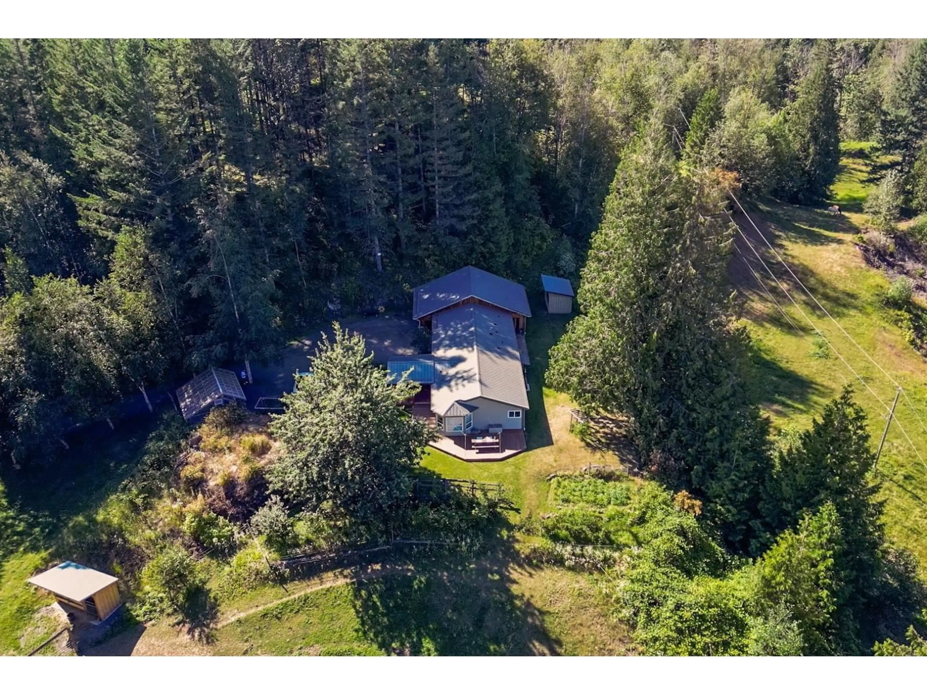 A pic from outside/outdoor area/front of a property/back of a property/a pic from drone, forest/trees view for 48522 ELK VIEW ROAD, Chilliwack British Columbia V4Z1H1