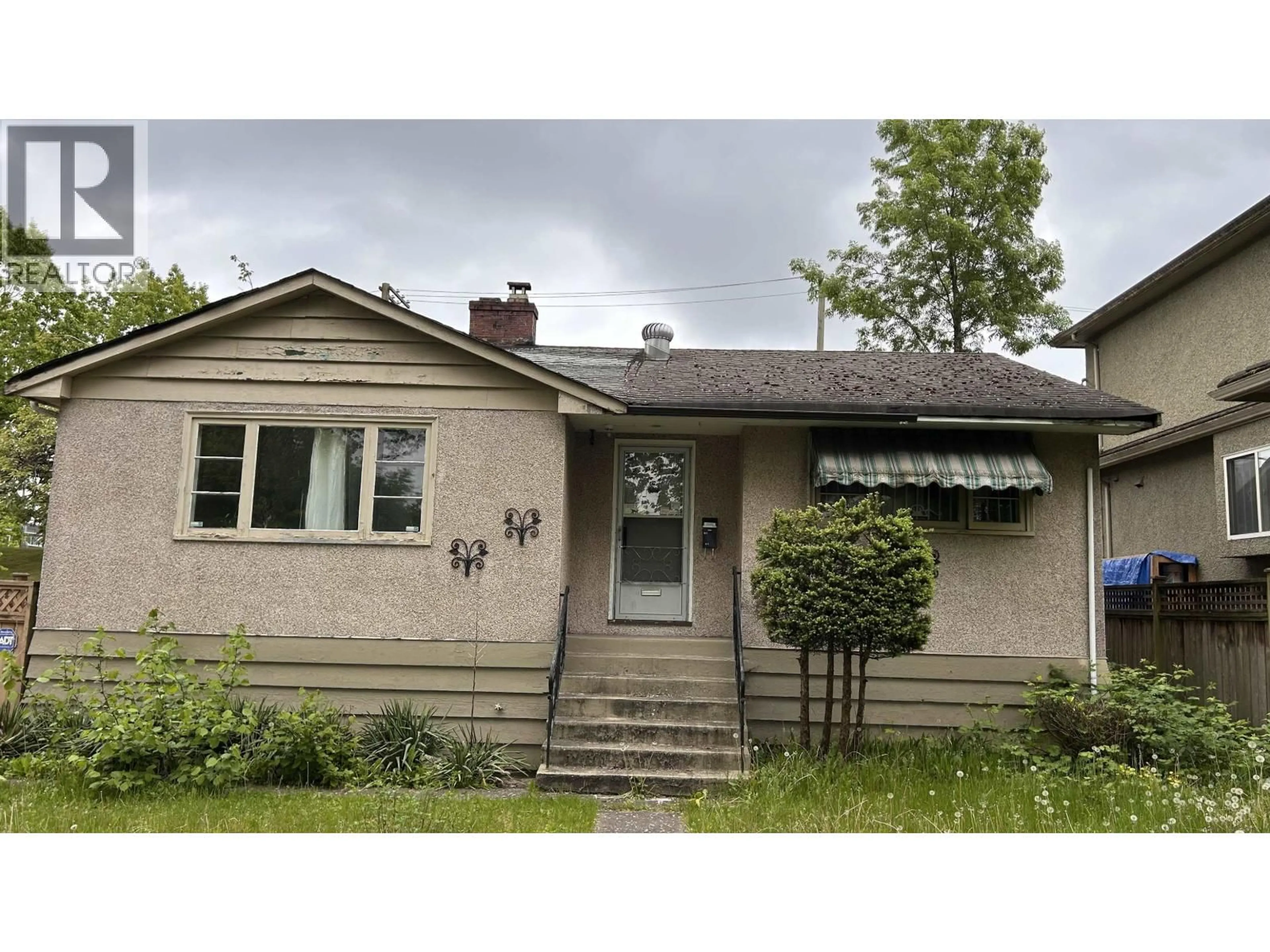 Home with vinyl exterior material, street for 2306 RUPERT STREET, Vancouver British Columbia V5M3T1