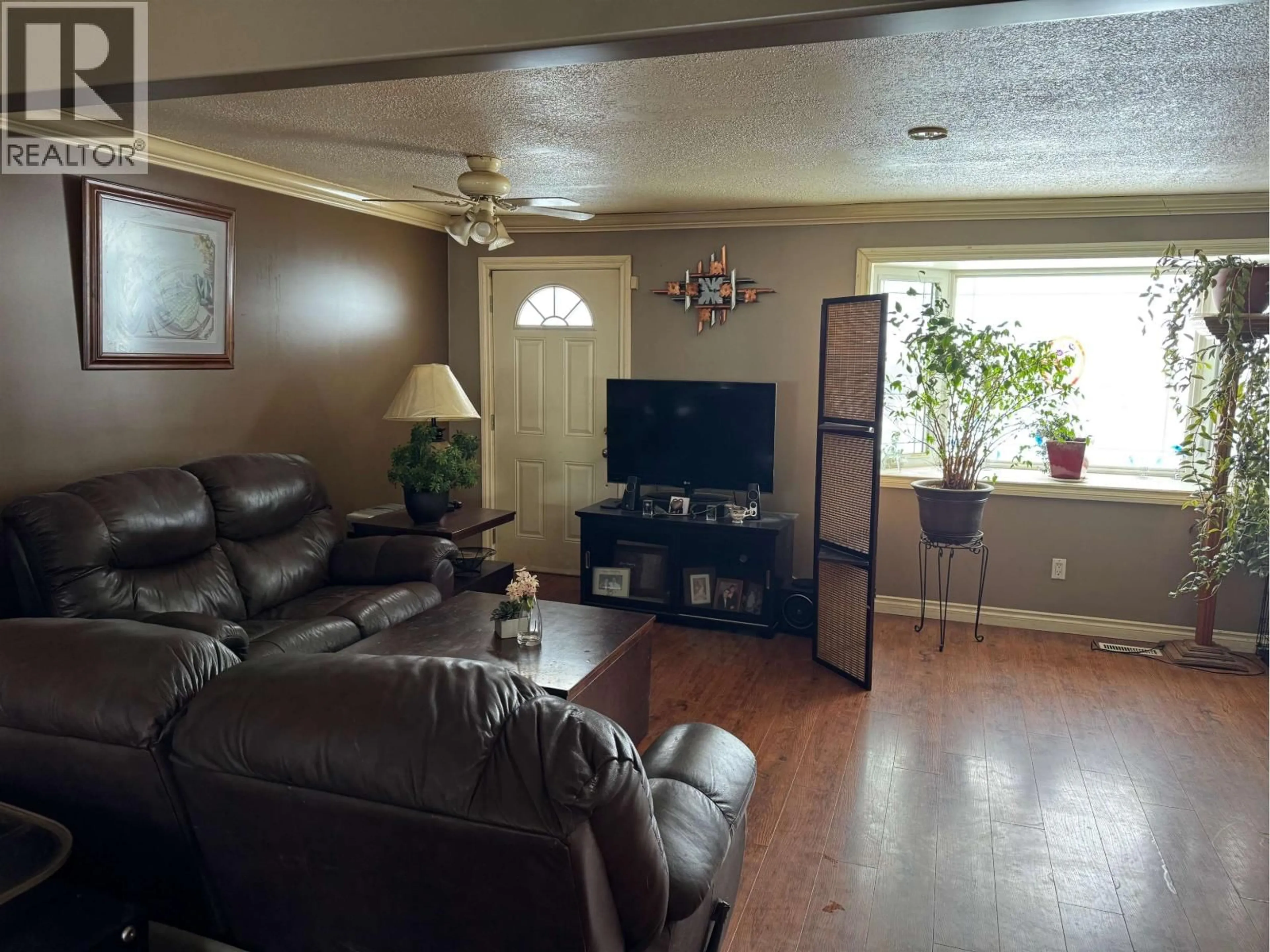 Living room with furniture, unknown for 9516 95 AVENUE, Fort St. John British Columbia V1J1H8