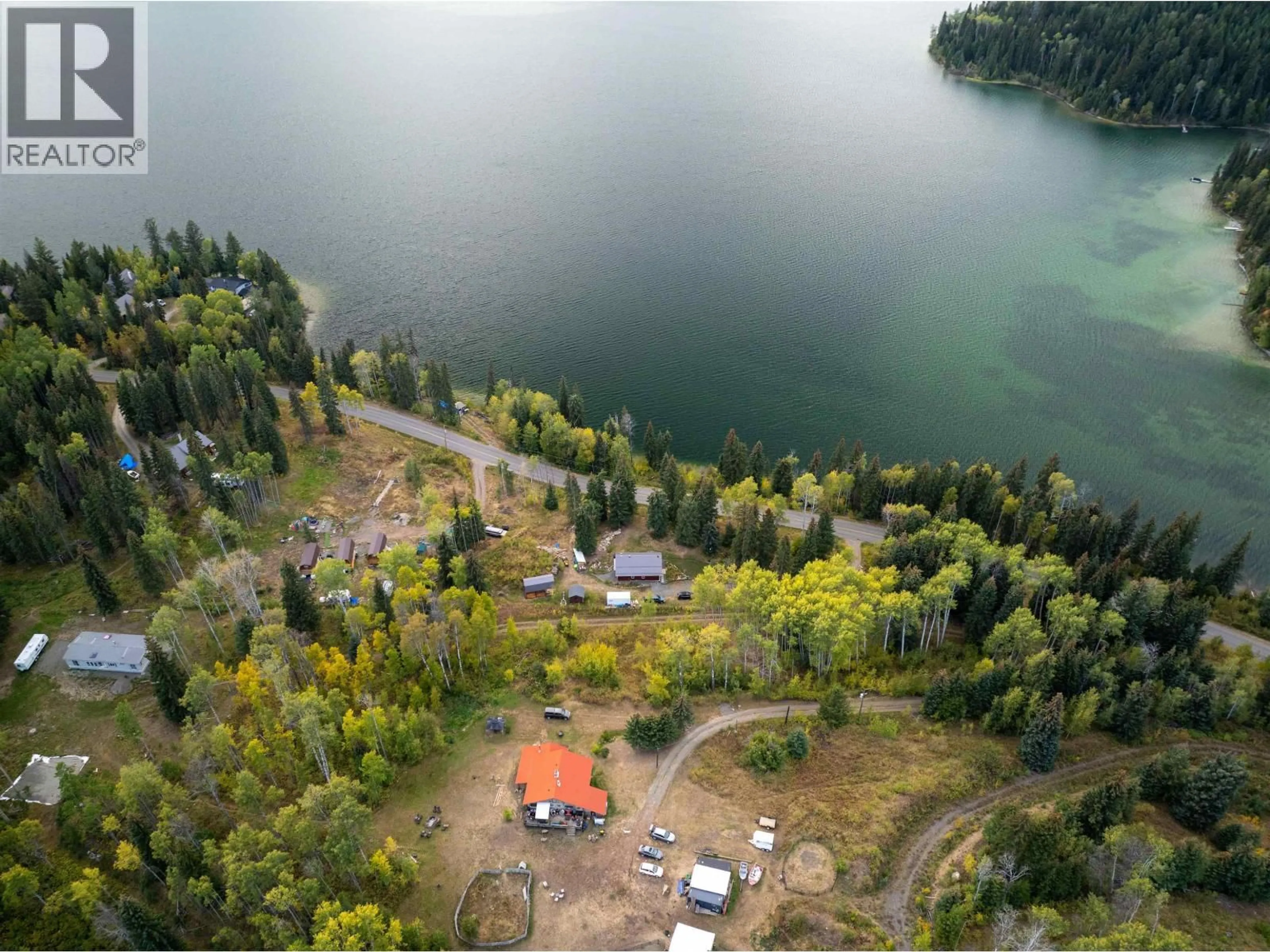 A pic from outside/outdoor area/front of a property/back of a property/a pic from drone, water/lake/river/ocean view for 8399 BRIDGE LAKE ROAD, Bridge Lake British Columbia V0K1X2
