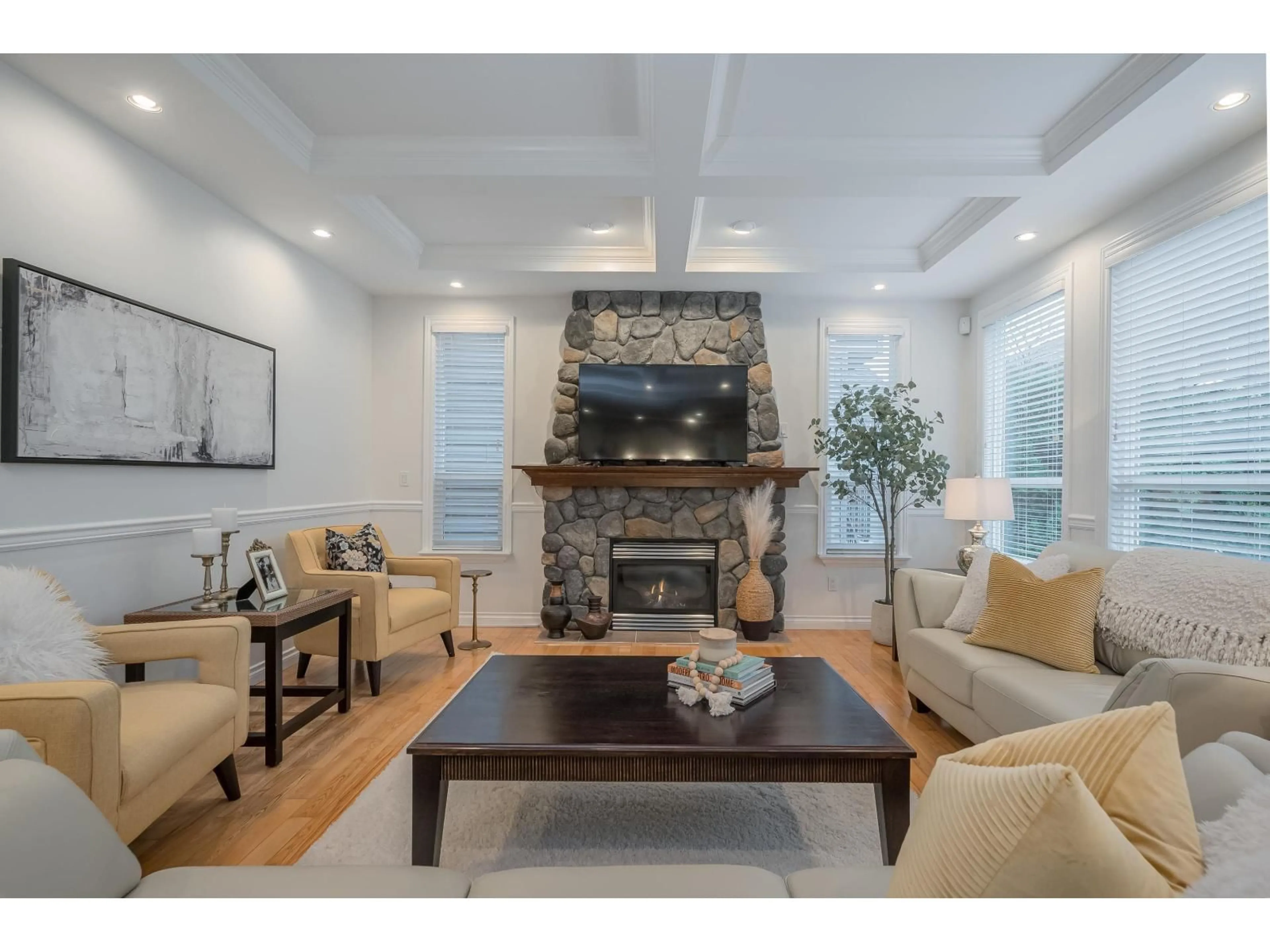 Living room with furniture, wood/laminate floor for 21650 91 AVENUE, Langley British Columbia V1M4C9