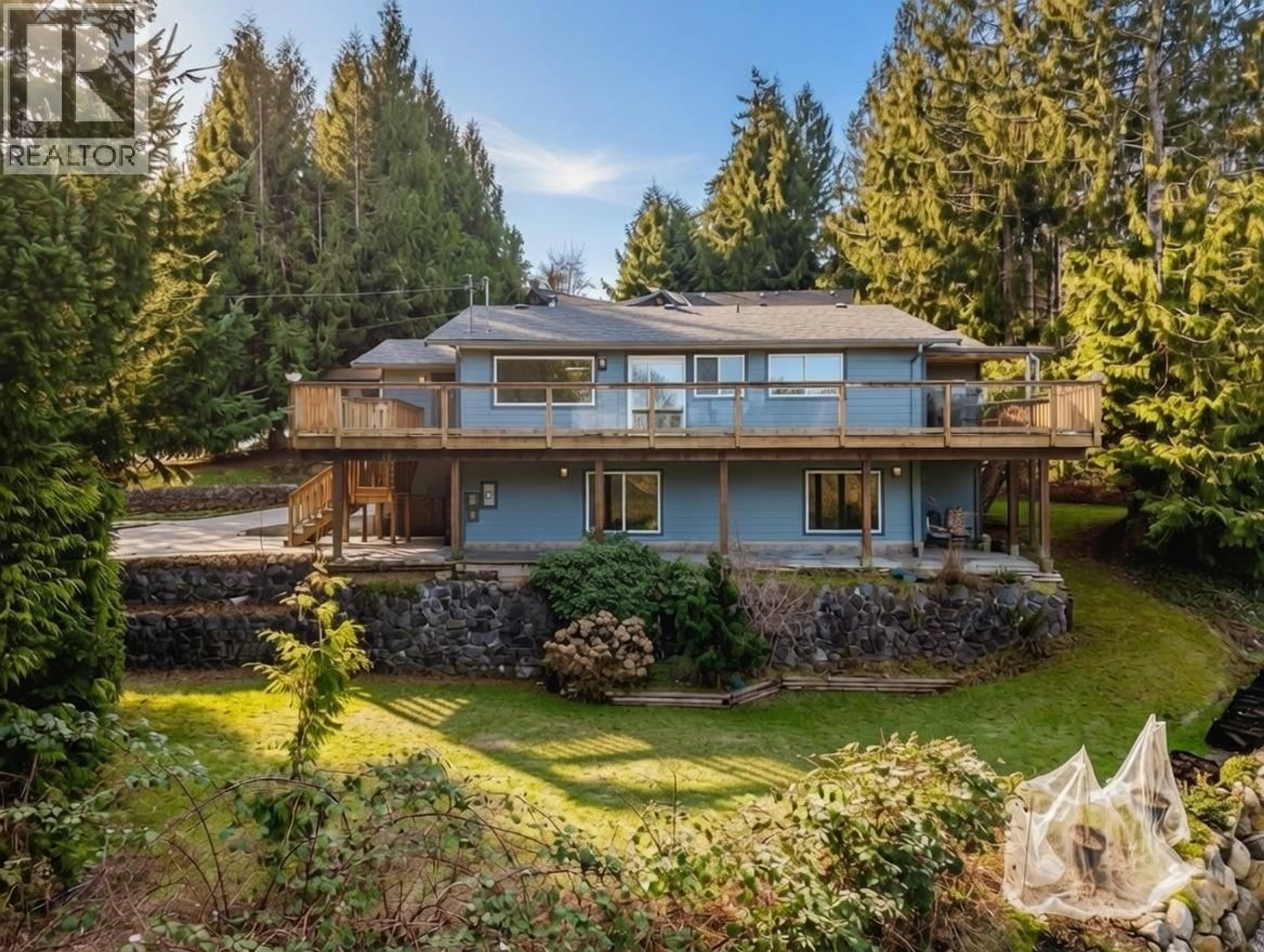 A pic from outside/outdoor area/front of a property/back of a property/a pic from drone, water/lake/river/ocean view for 5808 SKOOKUMCHUK ROAD, Sechelt British Columbia V7Z0P3