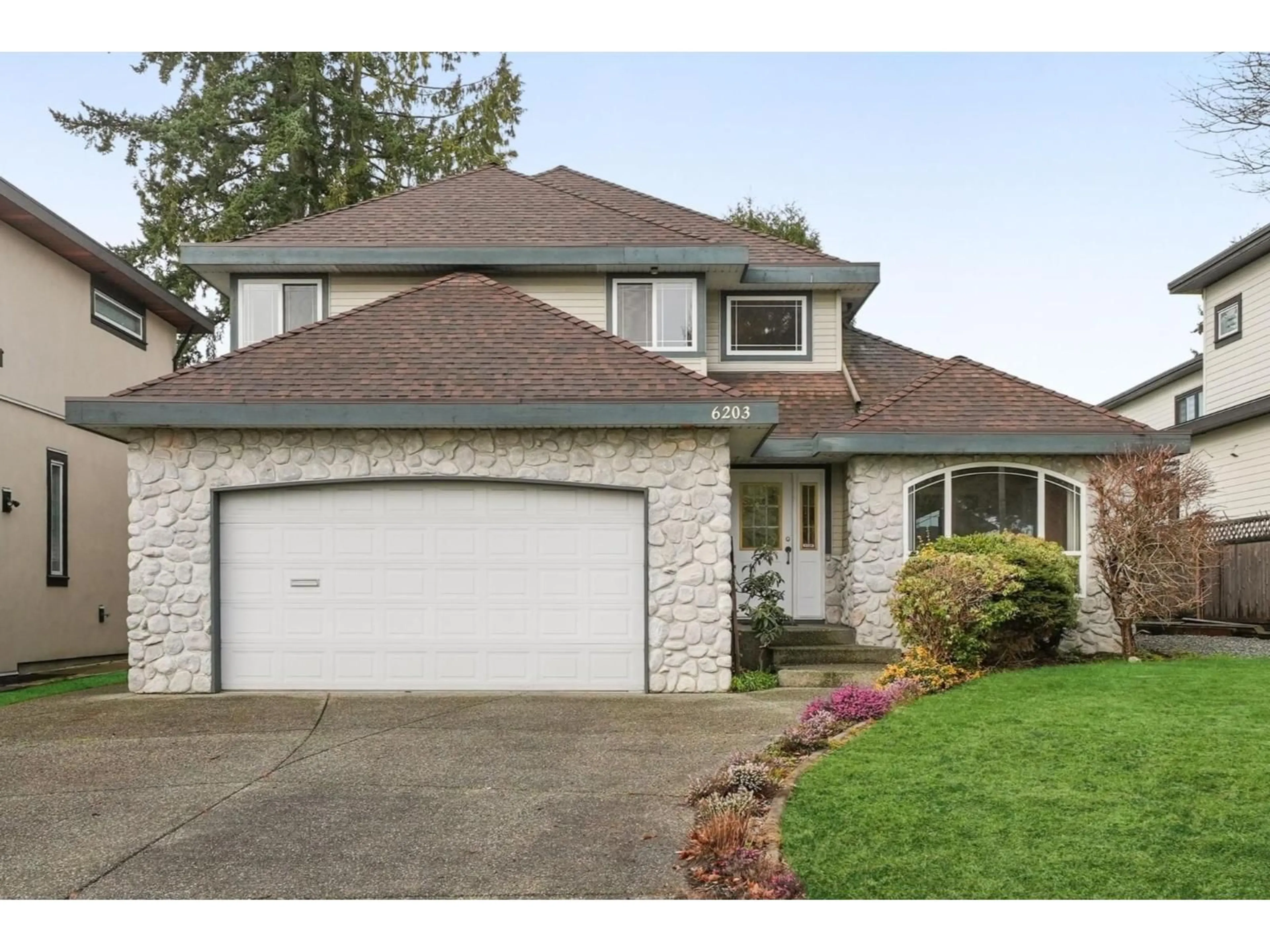 Home with vinyl exterior material, street for 6203 190 STREET, Surrey British Columbia V3S8S4