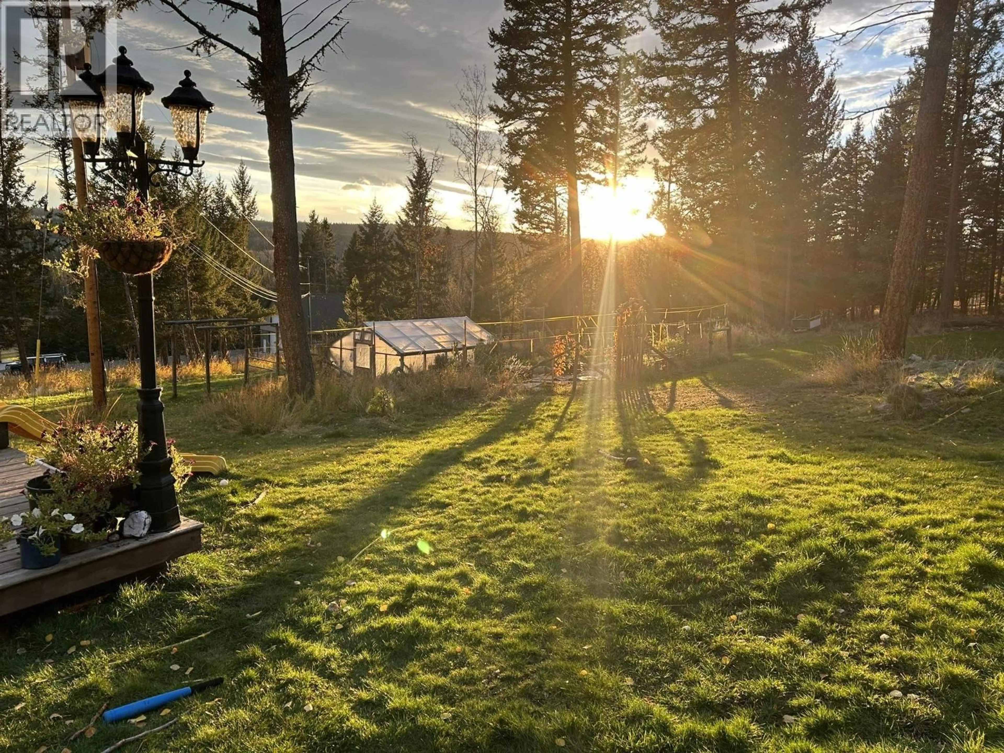 A pic from outside/outdoor area/front of a property/back of a property/a pic from drone, forest/trees view for 6001 VALLEYVIEW DRIVE, Horse Lake British Columbia V0K2E3