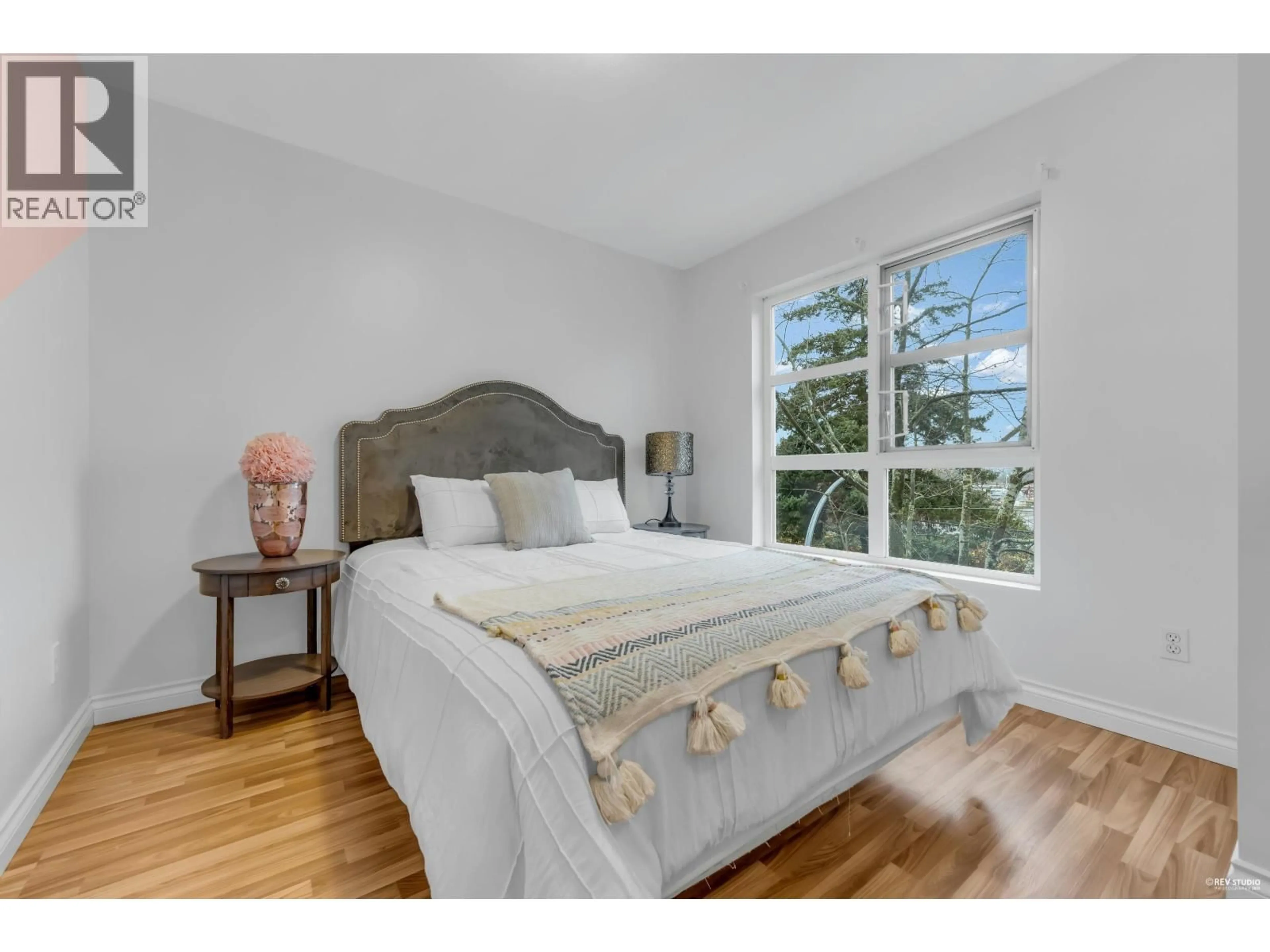 Bedroom with bed, wood/laminate floor for 260 - 13020 NO. 2 ROAD, Richmond British Columbia V7E6S3