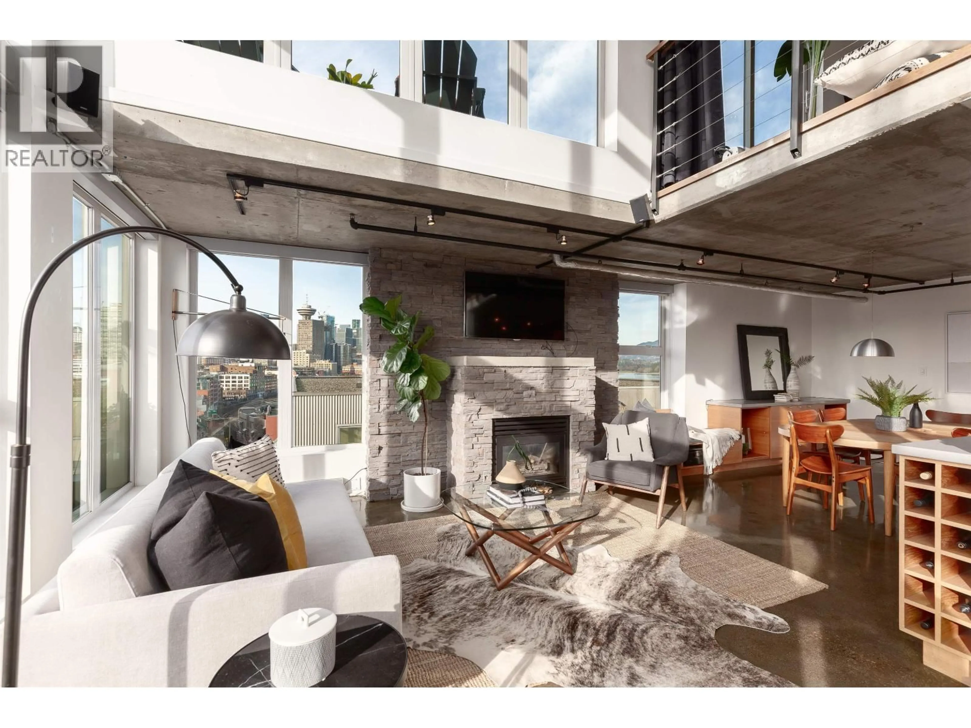 Living room with furniture, cement floor for 1002 - 289 ALEXANDER STREET, Vancouver British Columbia V6A4H6