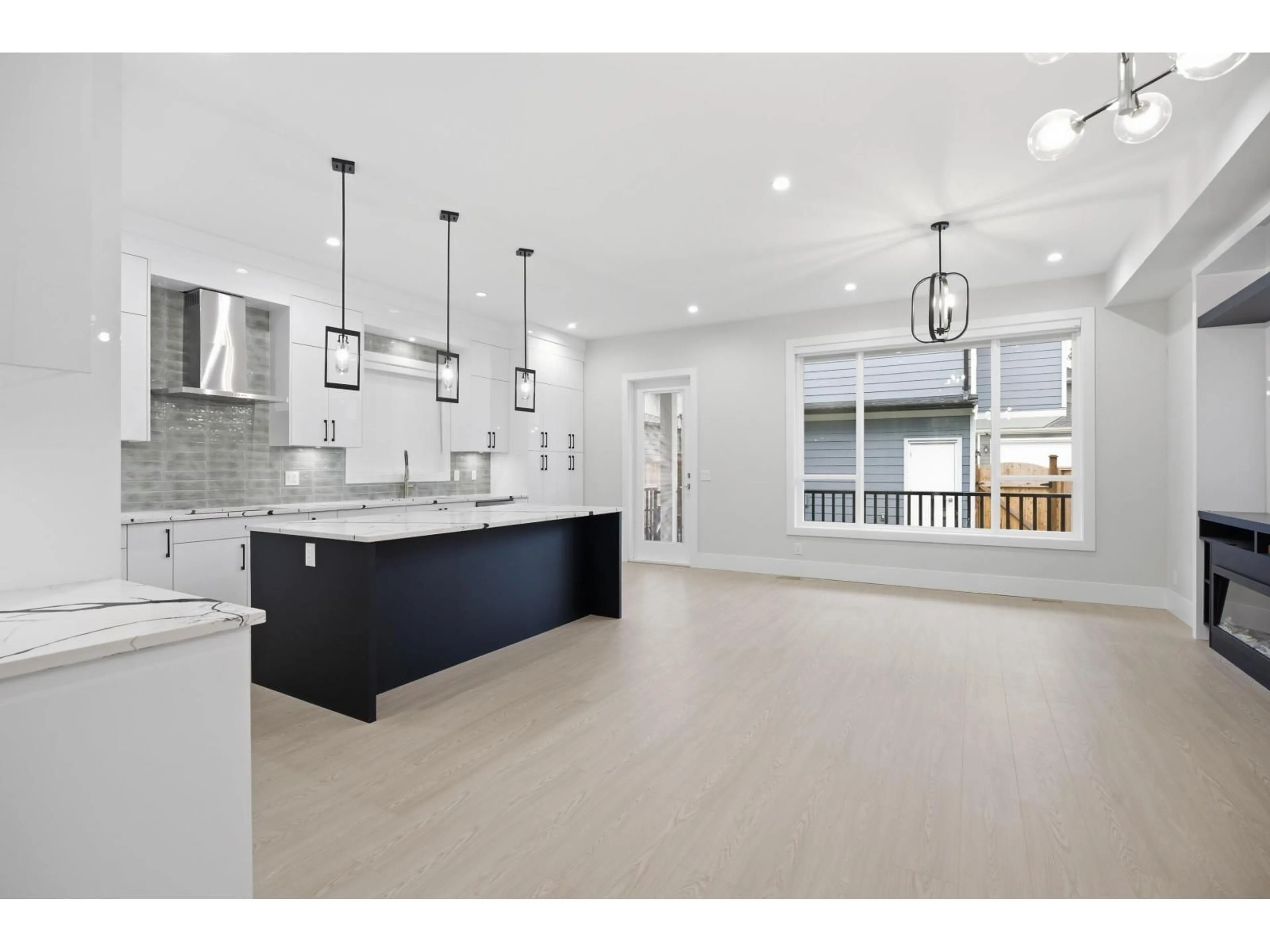 Open concept kitchen, ceramic/tile floor for 17156 1 AVENUE, Surrey British Columbia V3Z9R2