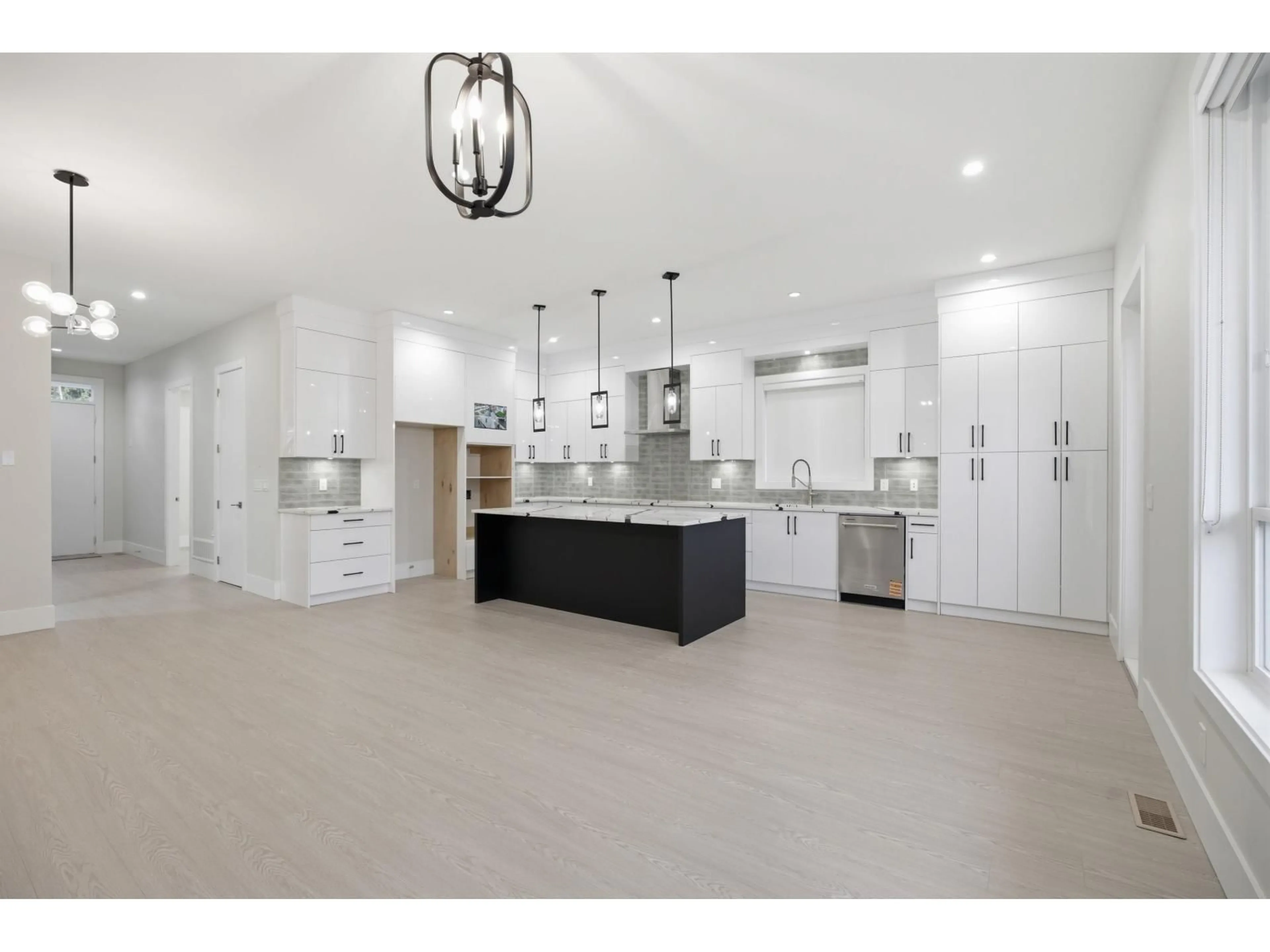 Open concept kitchen, ceramic/tile floor for 17156 1 AVENUE, Surrey British Columbia V3Z9R2