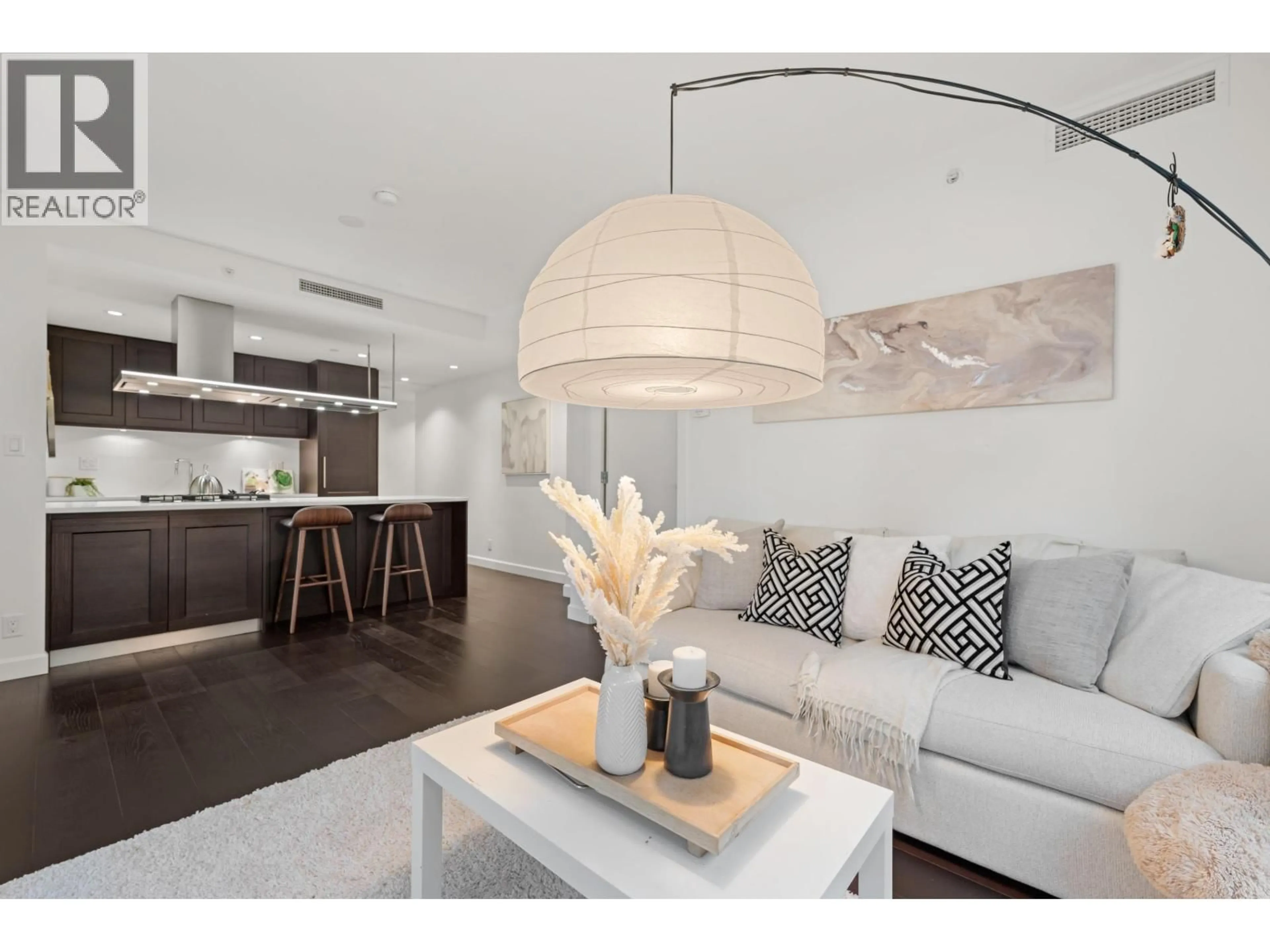 Living room with furniture, wood/laminate floor for 307 - 3355 BINNING ROAD, Vancouver British Columbia V6S0J1